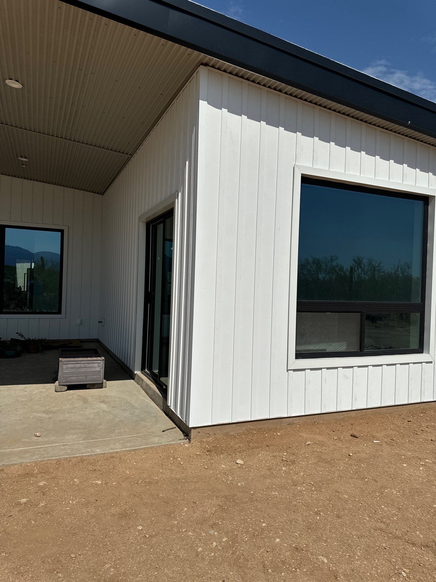 Polar White Metal Siding by Reimagine Roofing