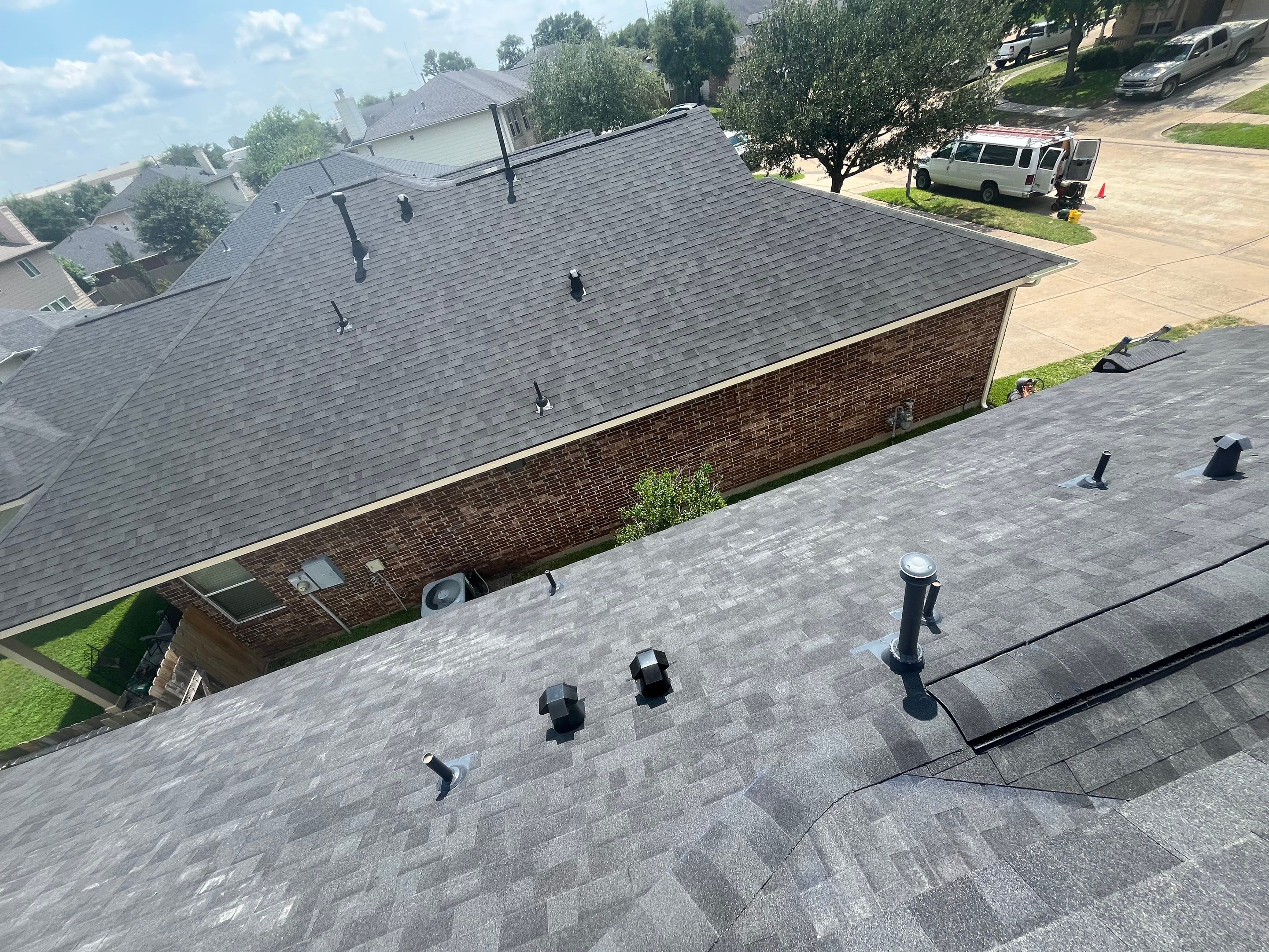 Residential Reroof and Exterior Window Project by Roofing Technologies Unlimited