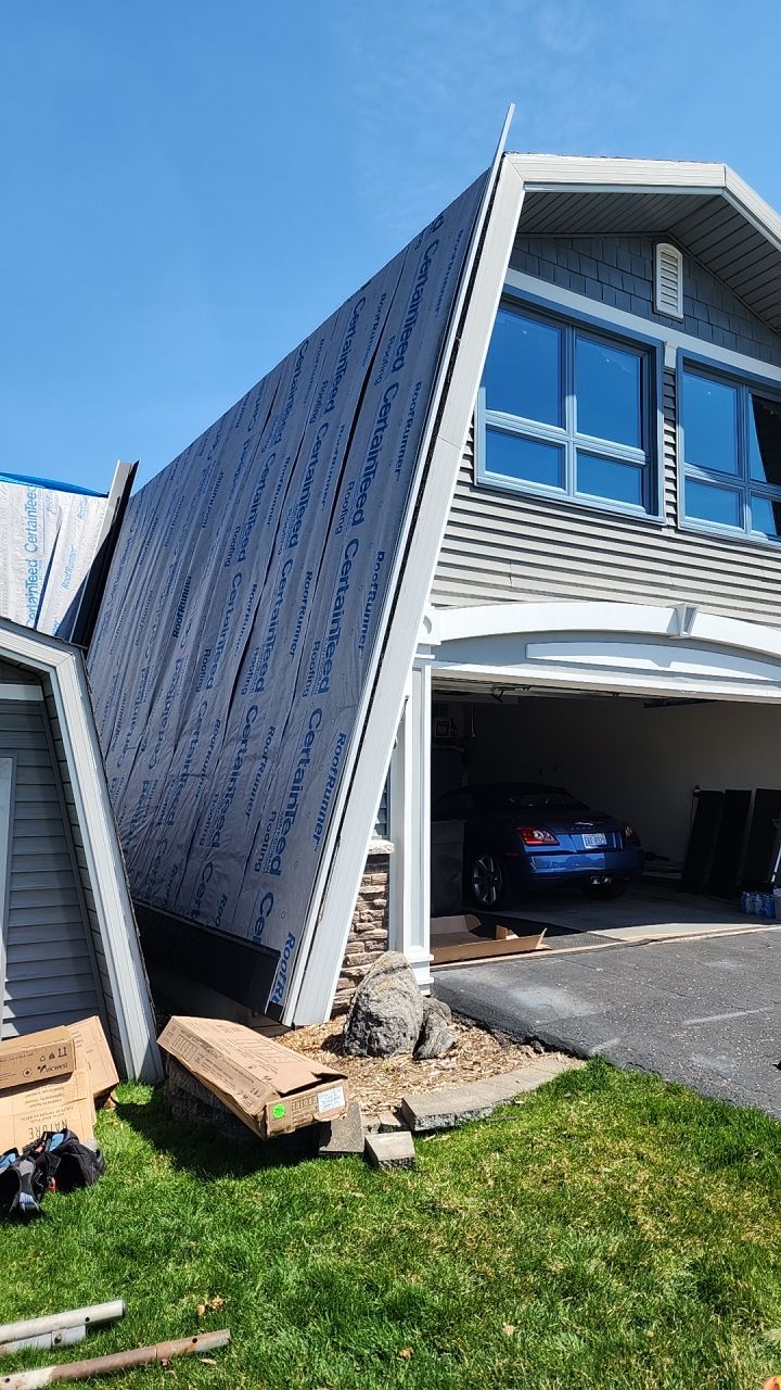 Metal Slate Shingle Roof in Sturgis, Michigan – “Darth Vader Helmet” Home by 4Ever Metal Roofing