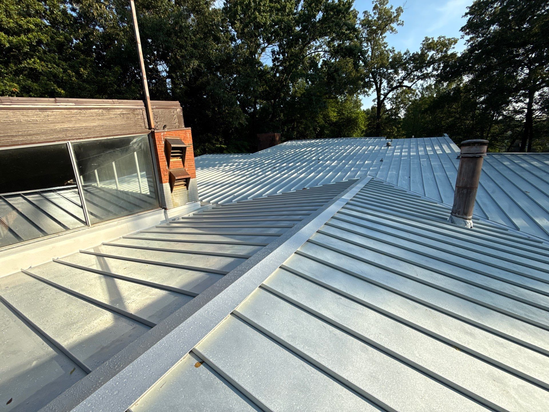 Residential Standing Seam Metal Roof and Membrane Replacement in Memphis by Revival Roofing Services