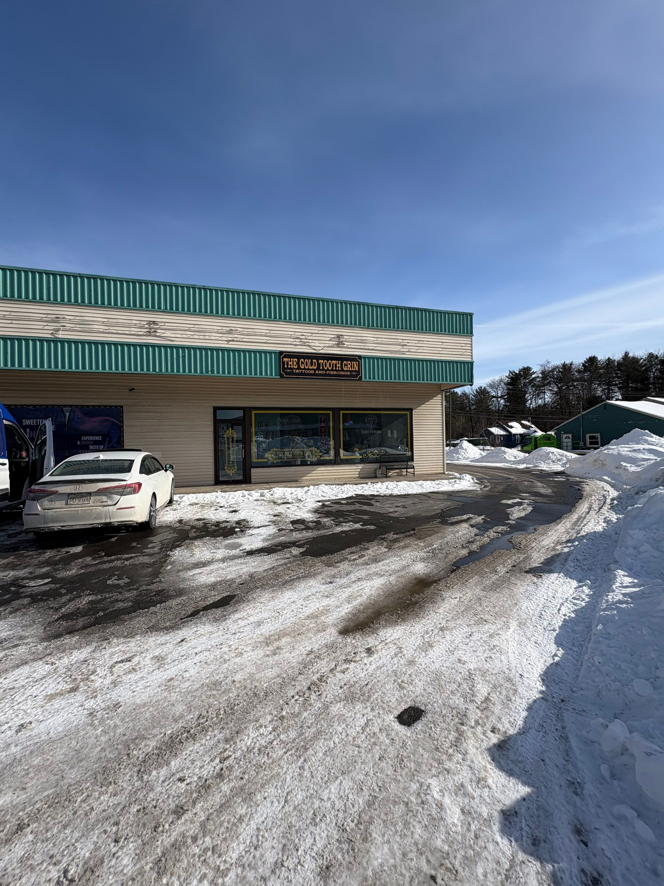 Gold Tooth Grin Tattoo Company Sign Installation in Gansevoort by FASTSIGNS of Saratoga Springs 