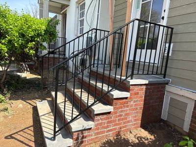 Custom Brick Step and Metal Railing Installation in Silver Spring