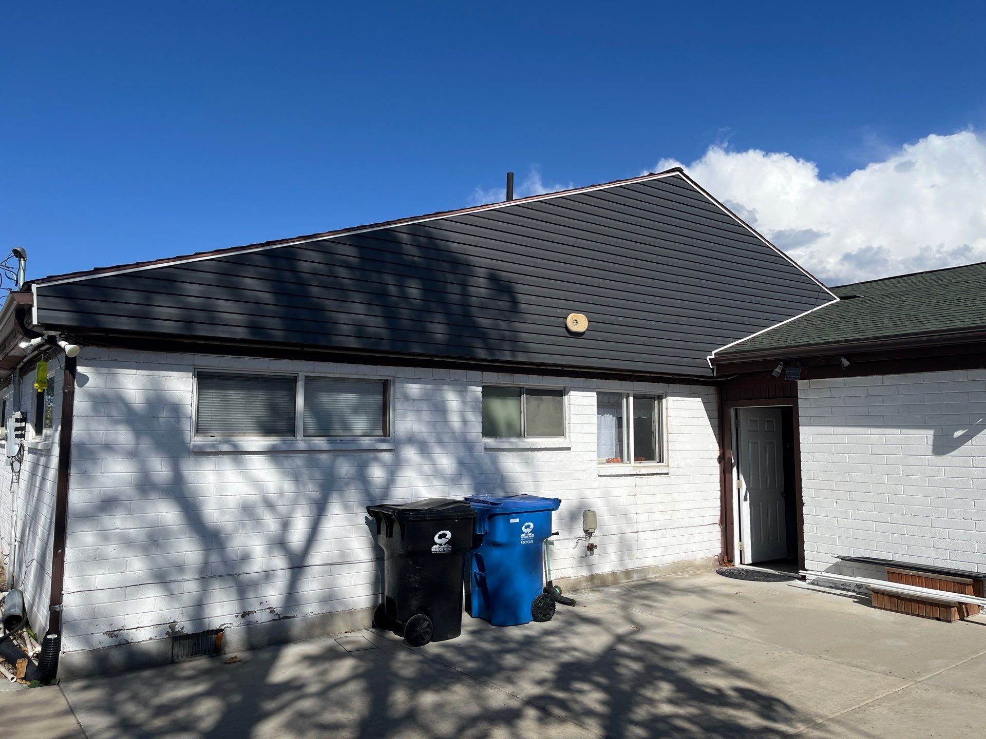 Sandy | Cedar Overlay Vinyl Installation | Nightfall & White by Ideal Siding Utah