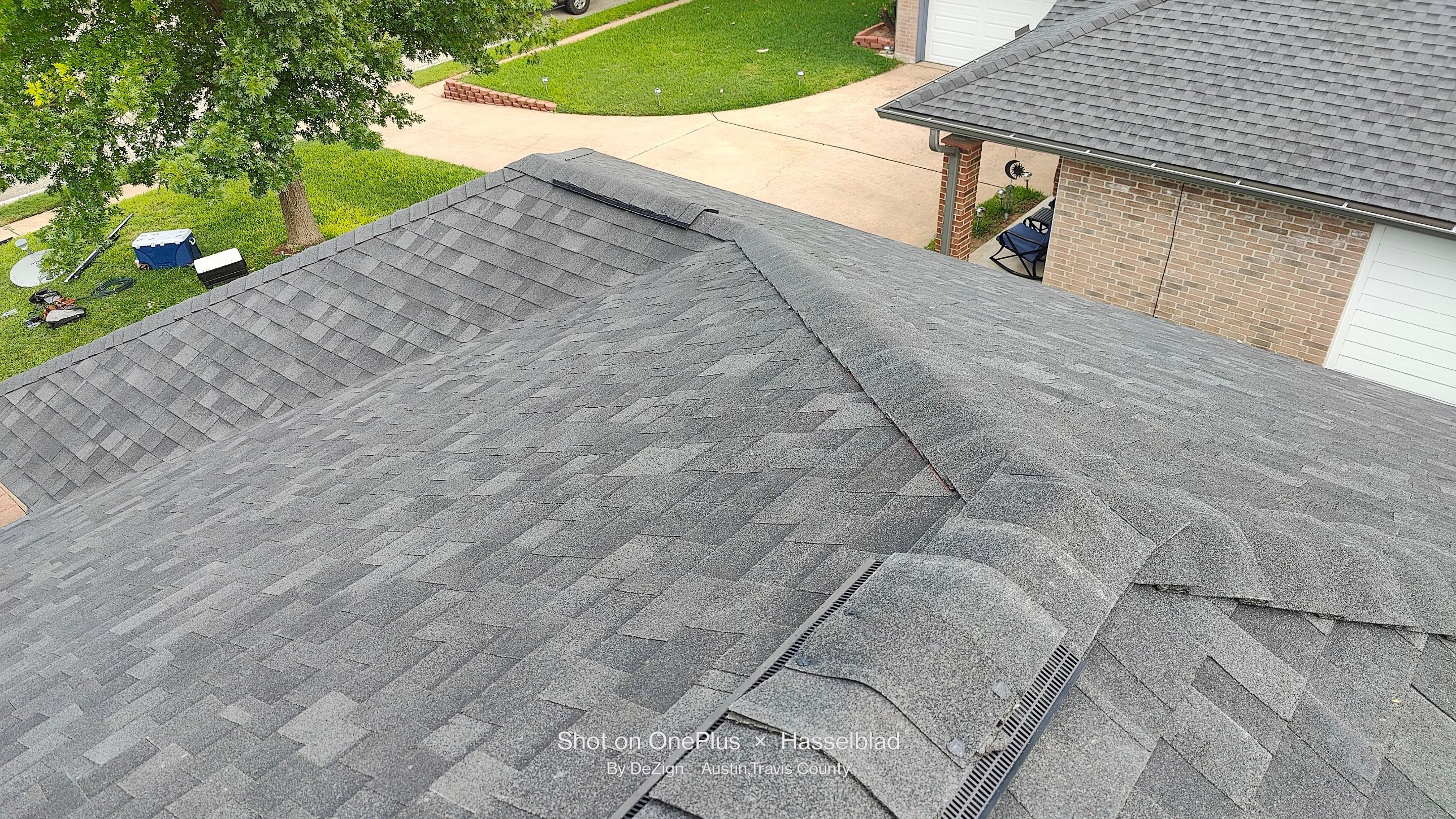 Residential Roofing Installation using Owens Corning Oakridge Onyx Black by DeZign Roofing & Exteriors