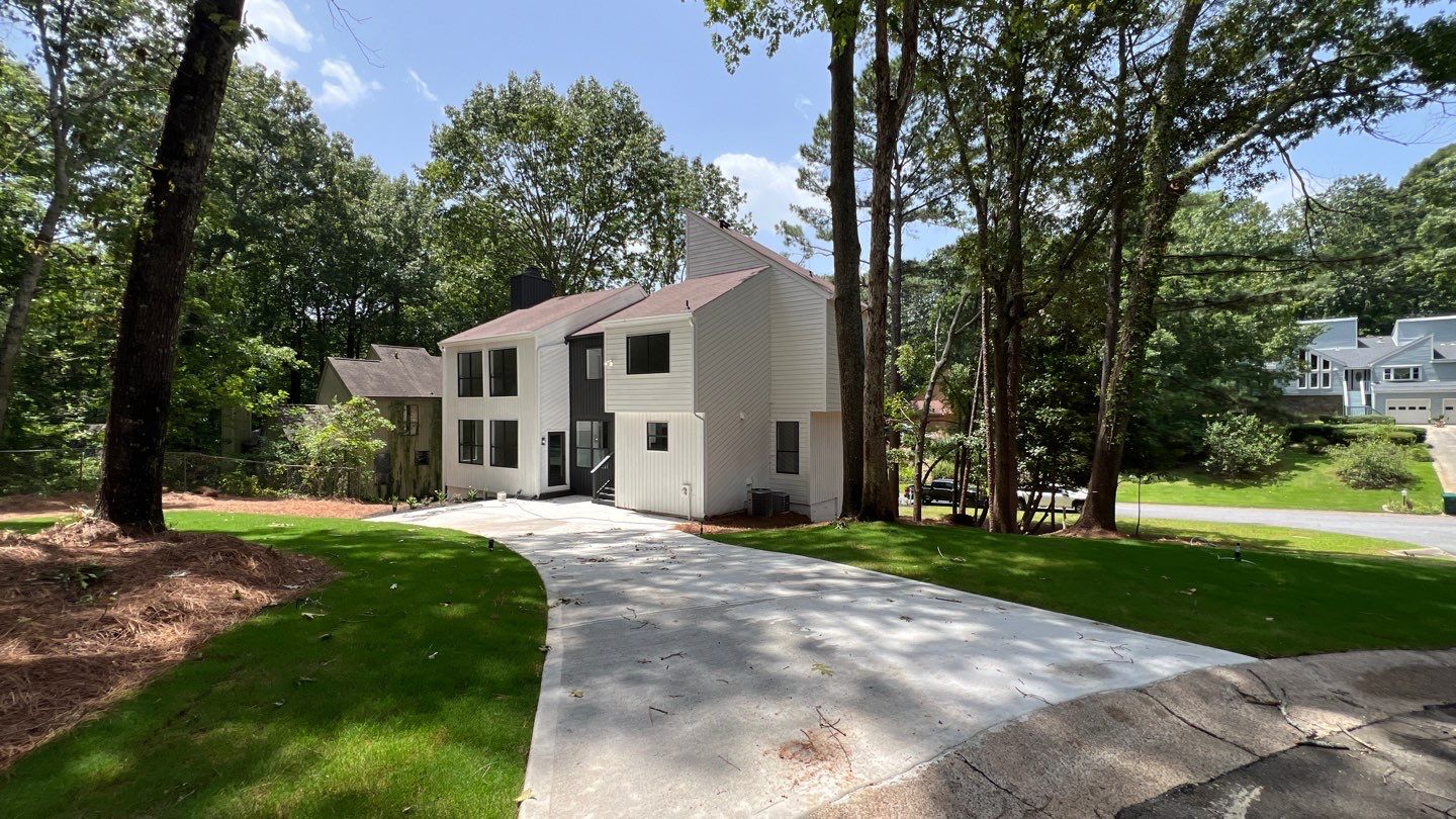 Modern Marietta Home Transformation with Custom Kitchen and Vertical Siding by Swift Home Renovations