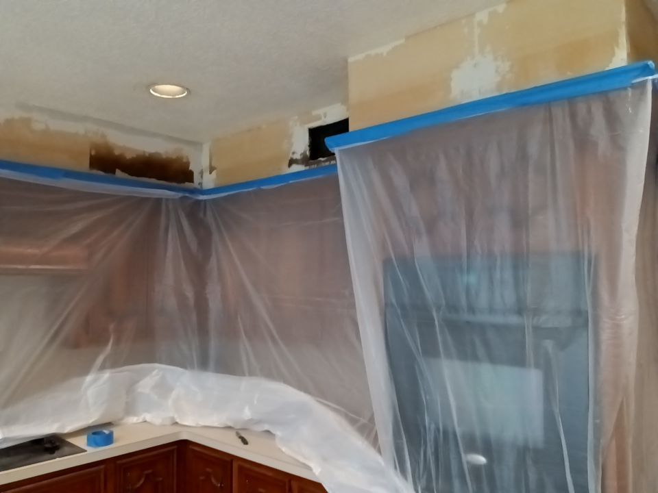 Interior and exterior painting project by Roof Concepts Construction