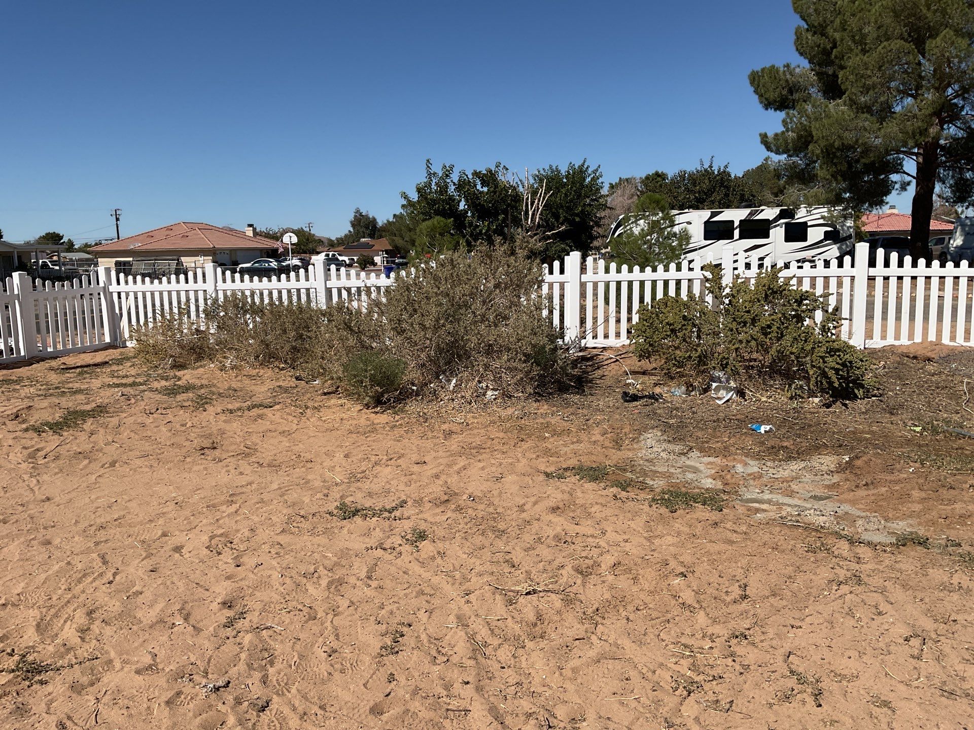 White picket fence  by Fence Guys Inc. 