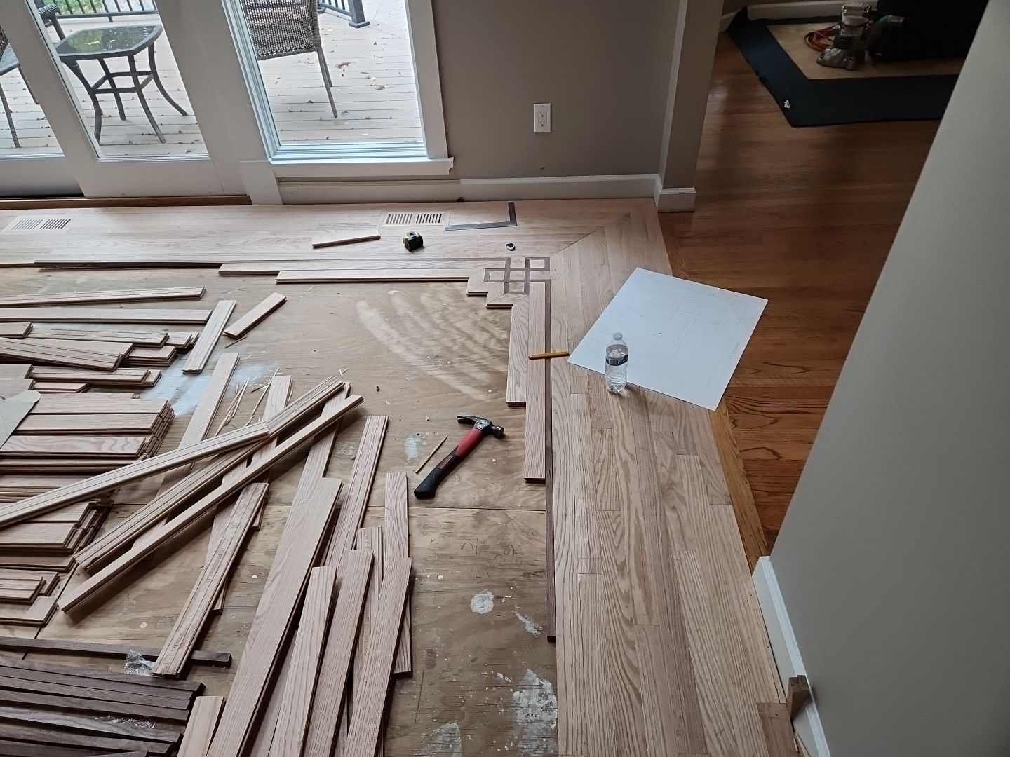 Ann Arbor Elegance: Red Oak and Walnut Living Room Masterpiece by Ann Arbor Hardwoods