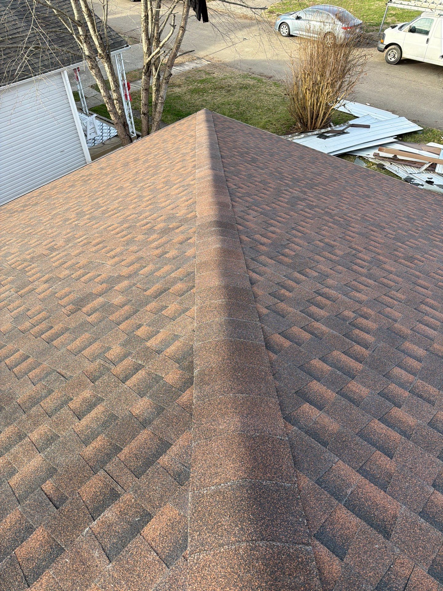 Residential Roofing Installation using GAF TImberline HDZ Hickory by Rainstoppers Roofing