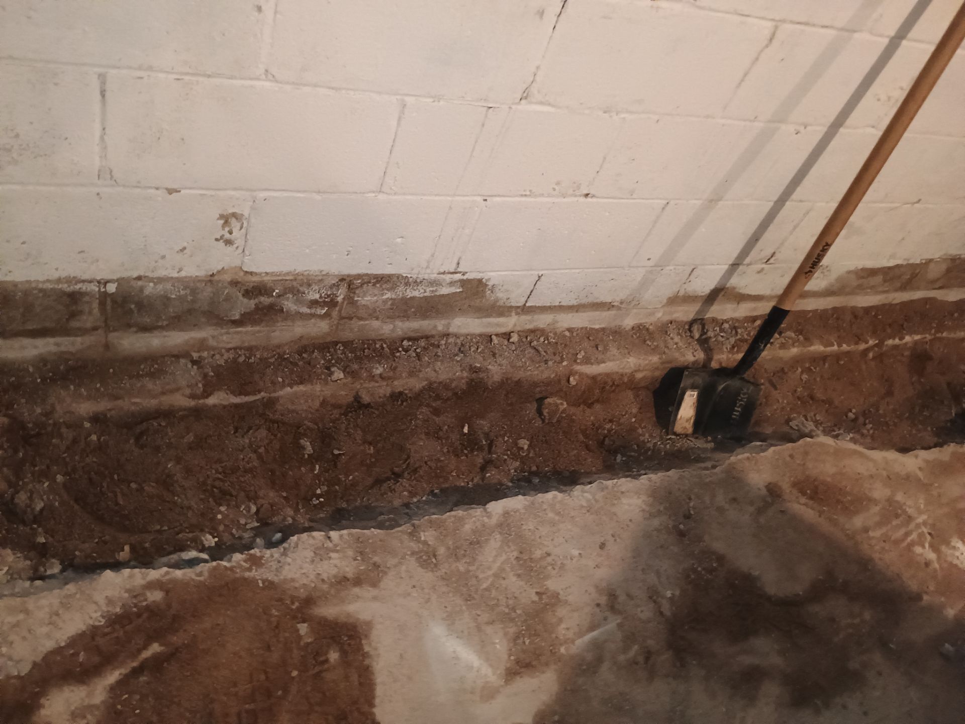 Interior Drain Tile Installation near Columbia Heights, MN by Waterproofing Northeast
