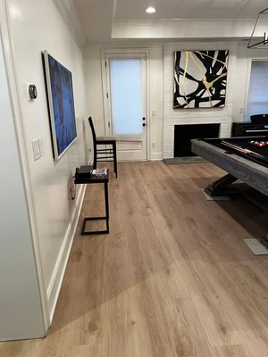 Atlanta Basement Refinishing with Wood Laminate Flooring and Interior Painting