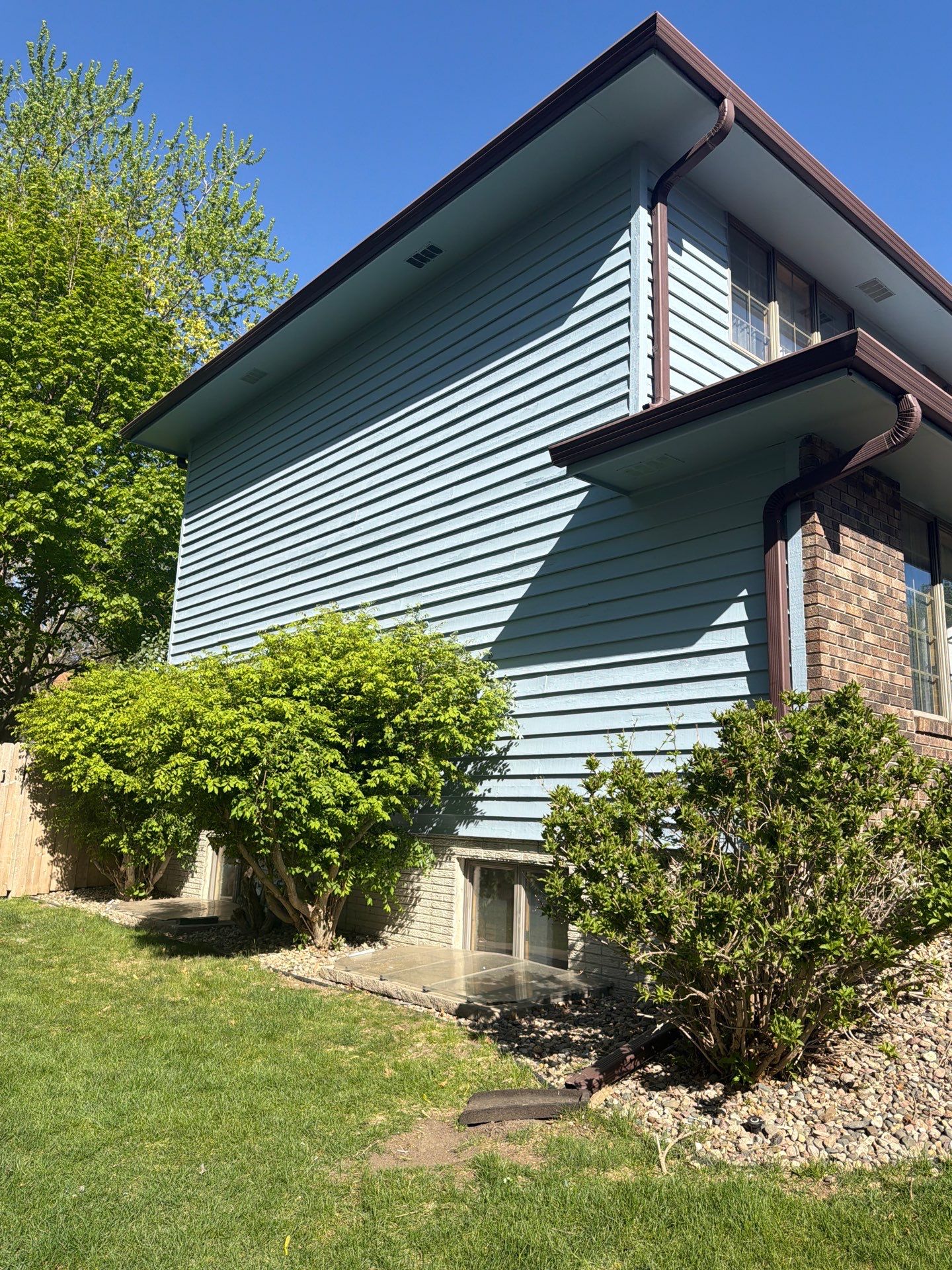 Full Exterior Home Painting and Siding Refurbishment in Sioux Falls by Select Painting, Coatings & Garage Cabinets