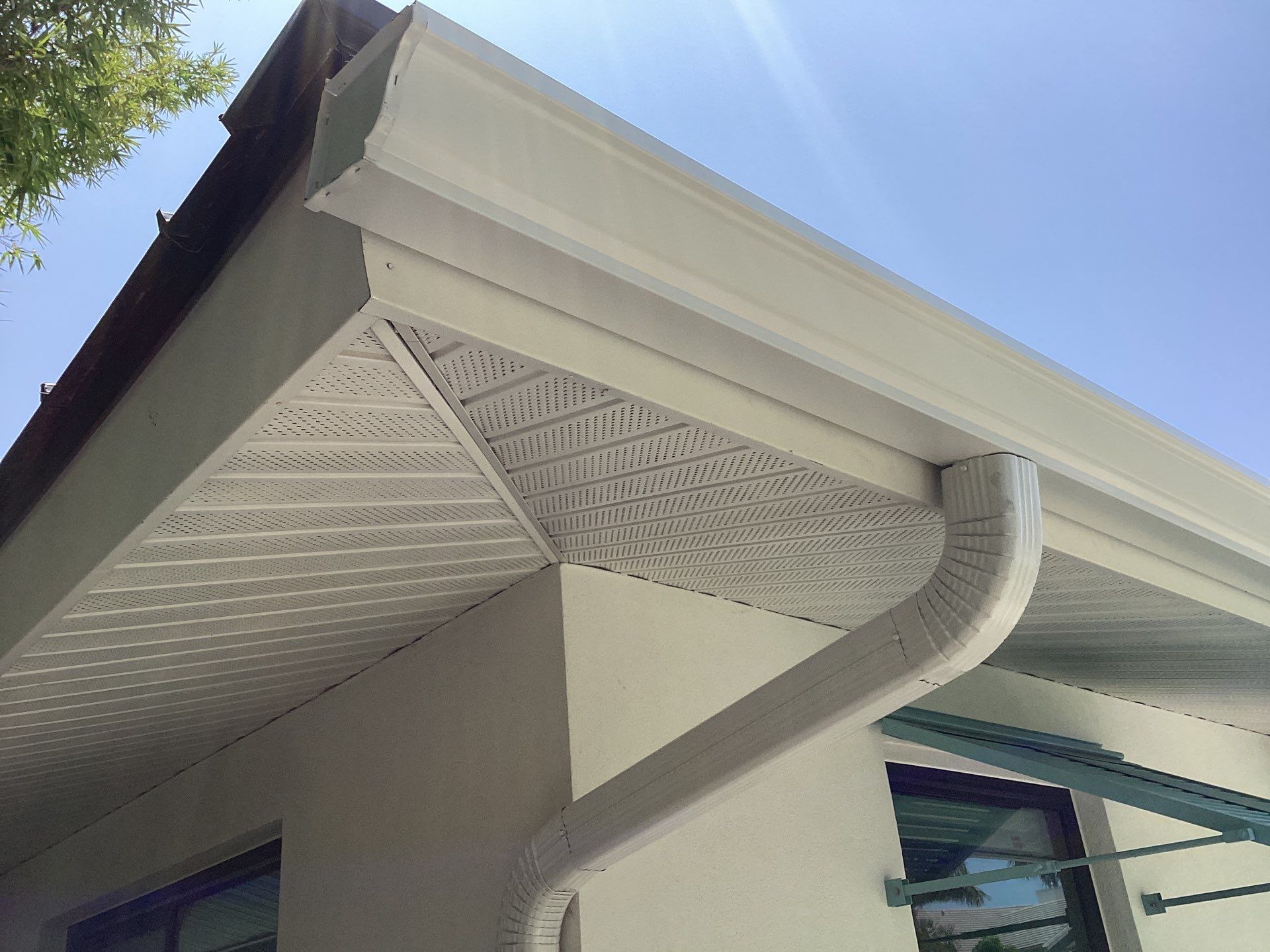 White Seamless Gutters and Downspouts in Sarasota FL by Gutter Professors