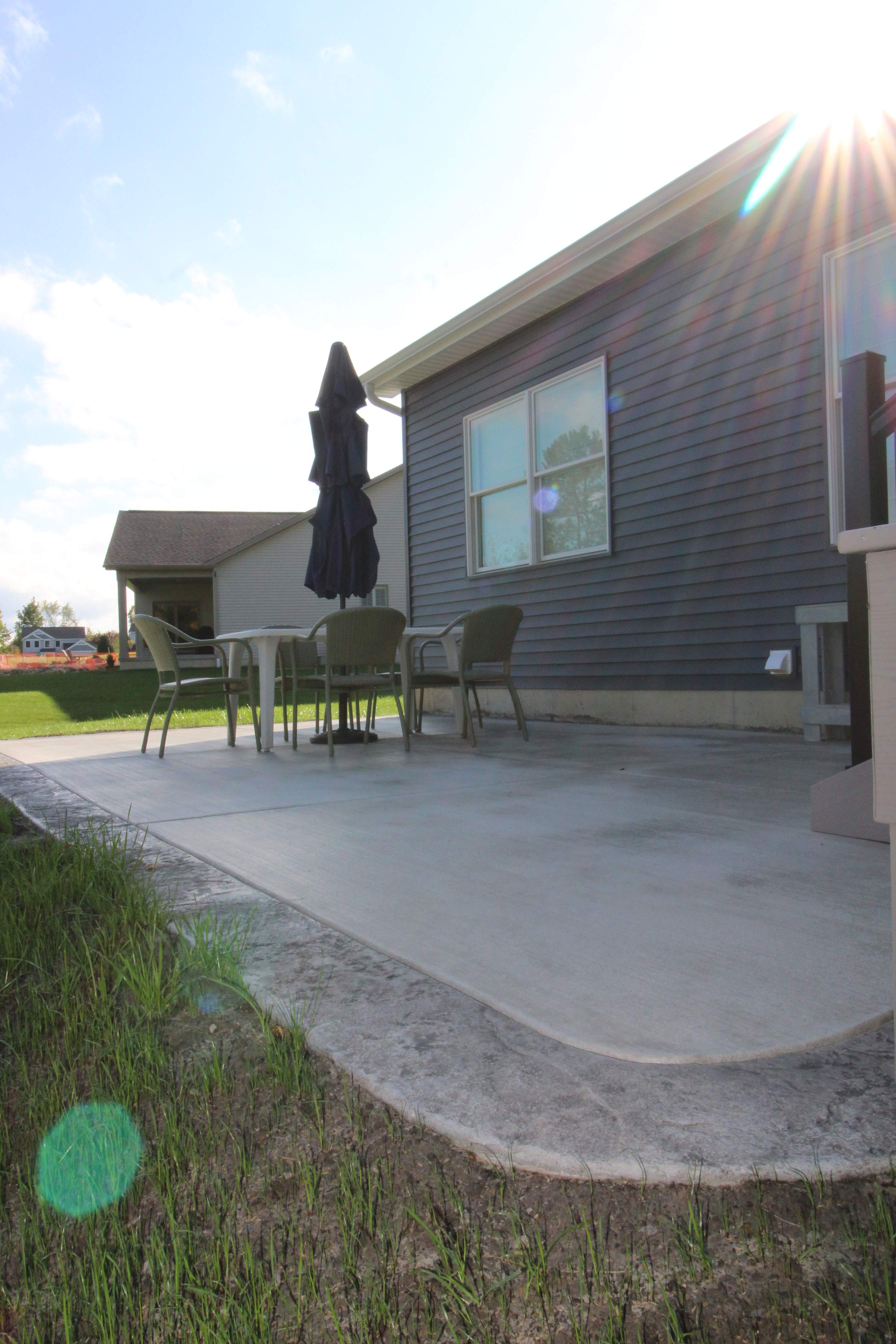 Outdoor Living- Deck and Concrete by Ivy Lea Construction