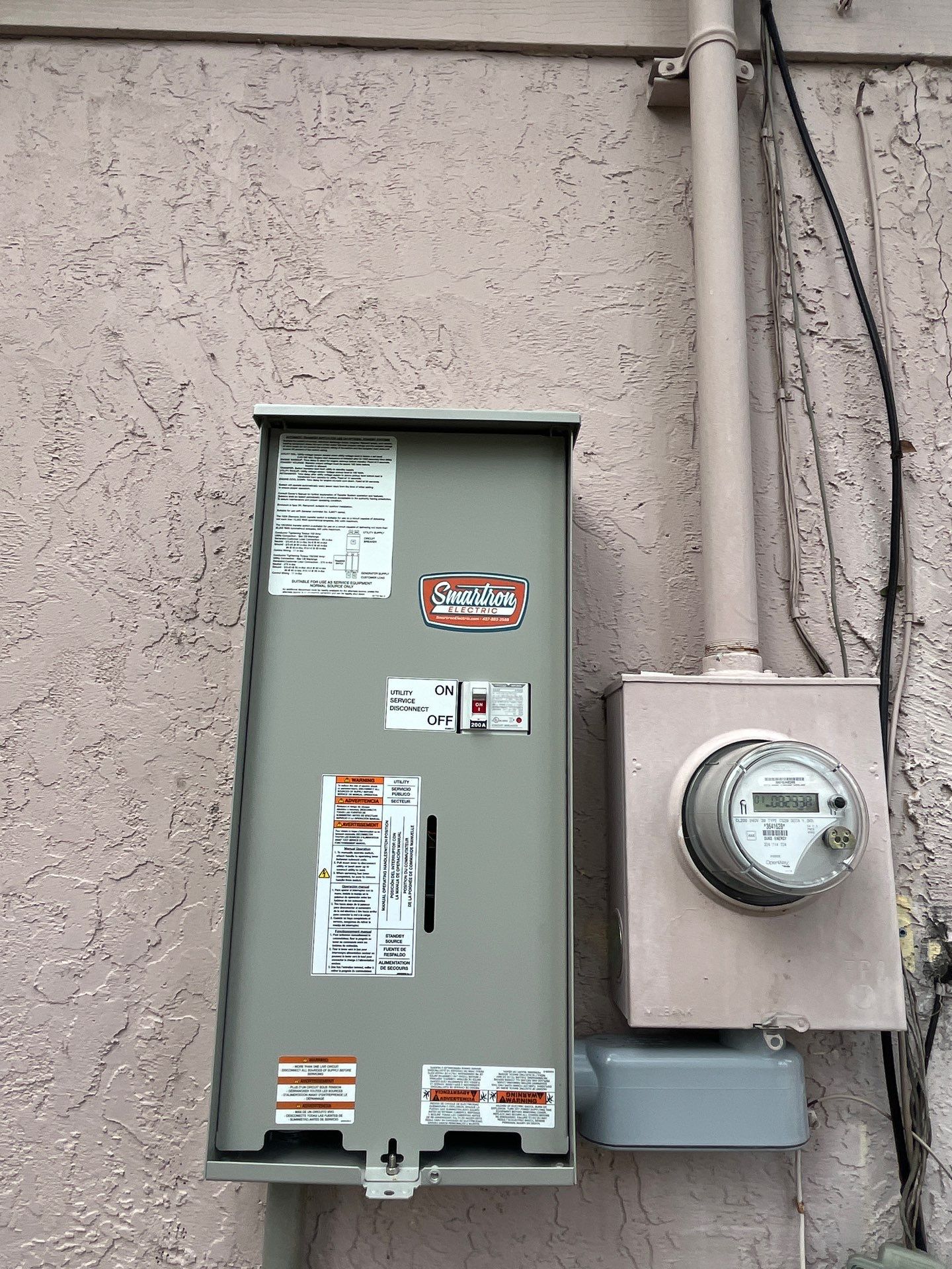 Installation of a 26 kw Generac Whole-Home Standby Generator and 200Amp Automatic Transfer Switch by Smartron Electric