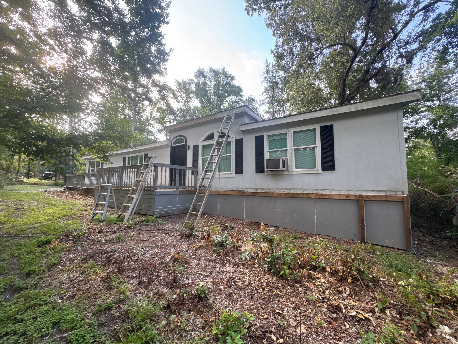 Exterior Painting in Tyler, TX | Black Back Porch, Wood & Shutters by Quality Coats Painting