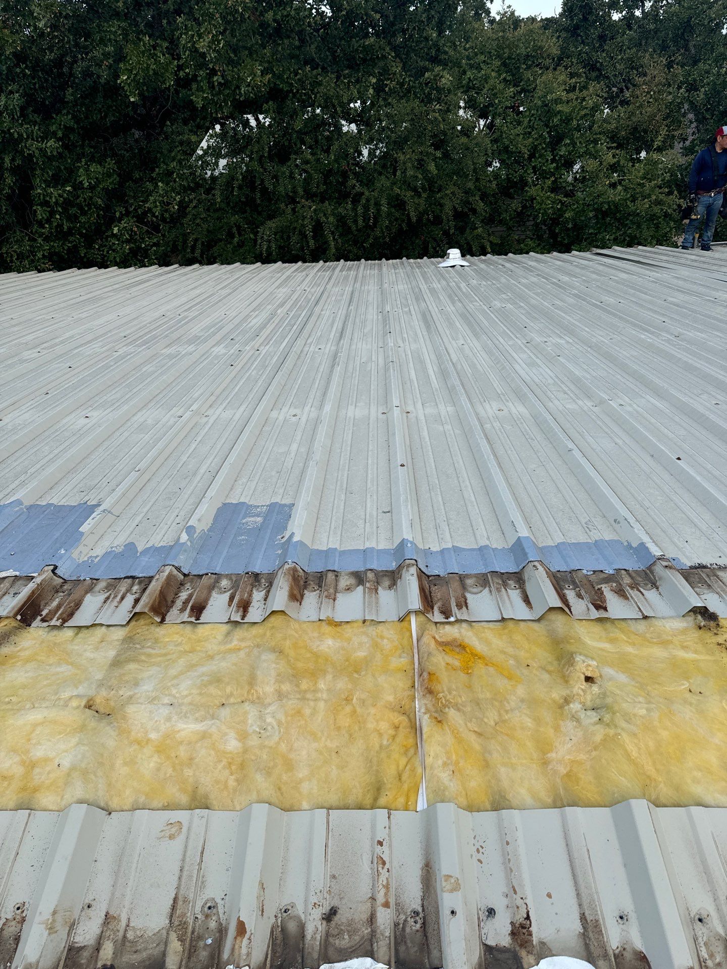 R-Panel Replacement by First Out Roofing 