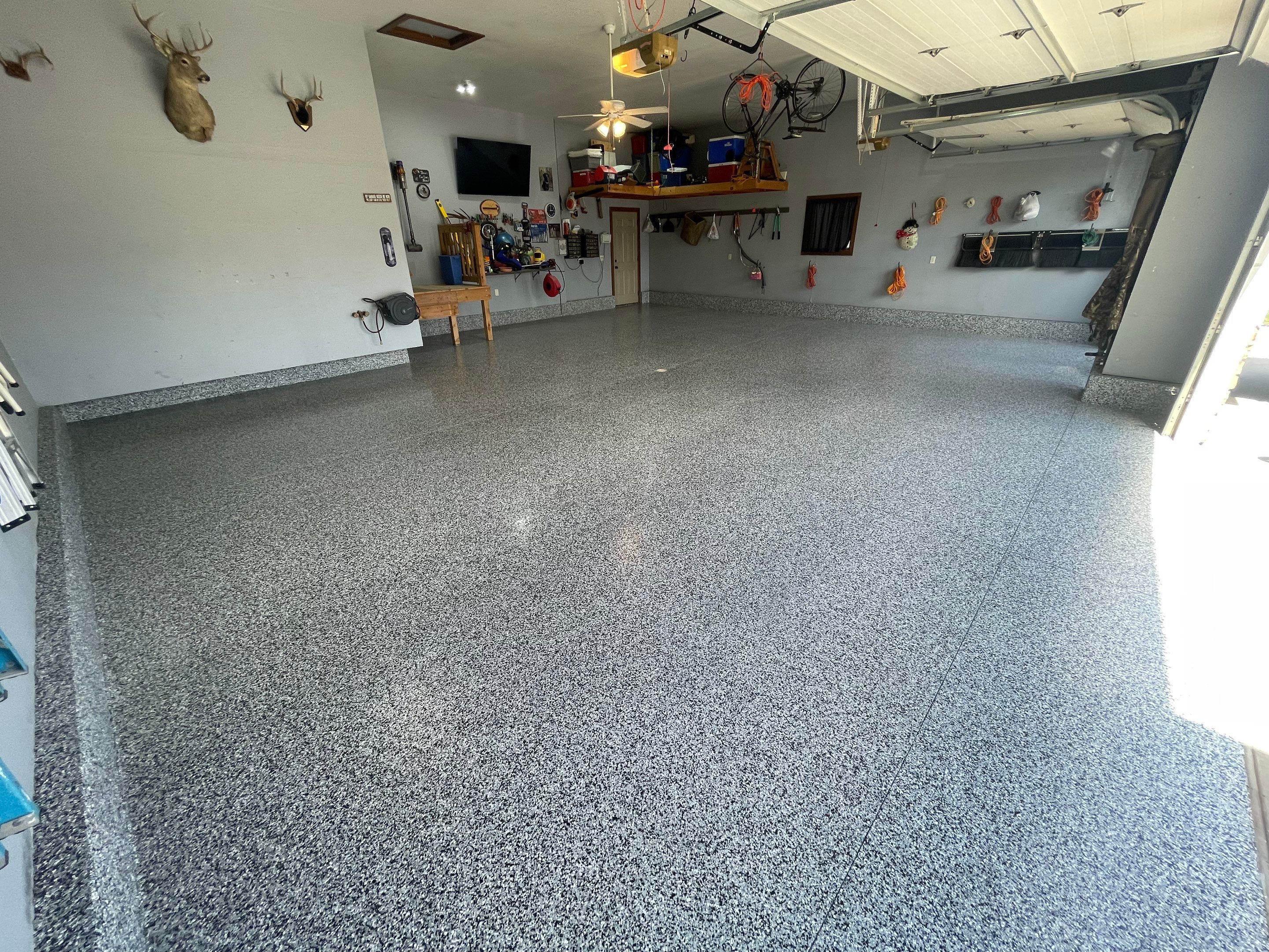 Residential Garage Floor Coating in Sioux Falls by Select Painting, Coatings & Garage Cabinets