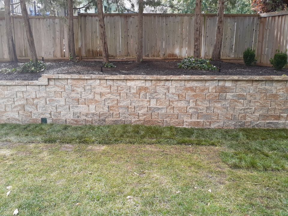 Back Yard Harington Retaining Wall by LAND ESCAPES LLC