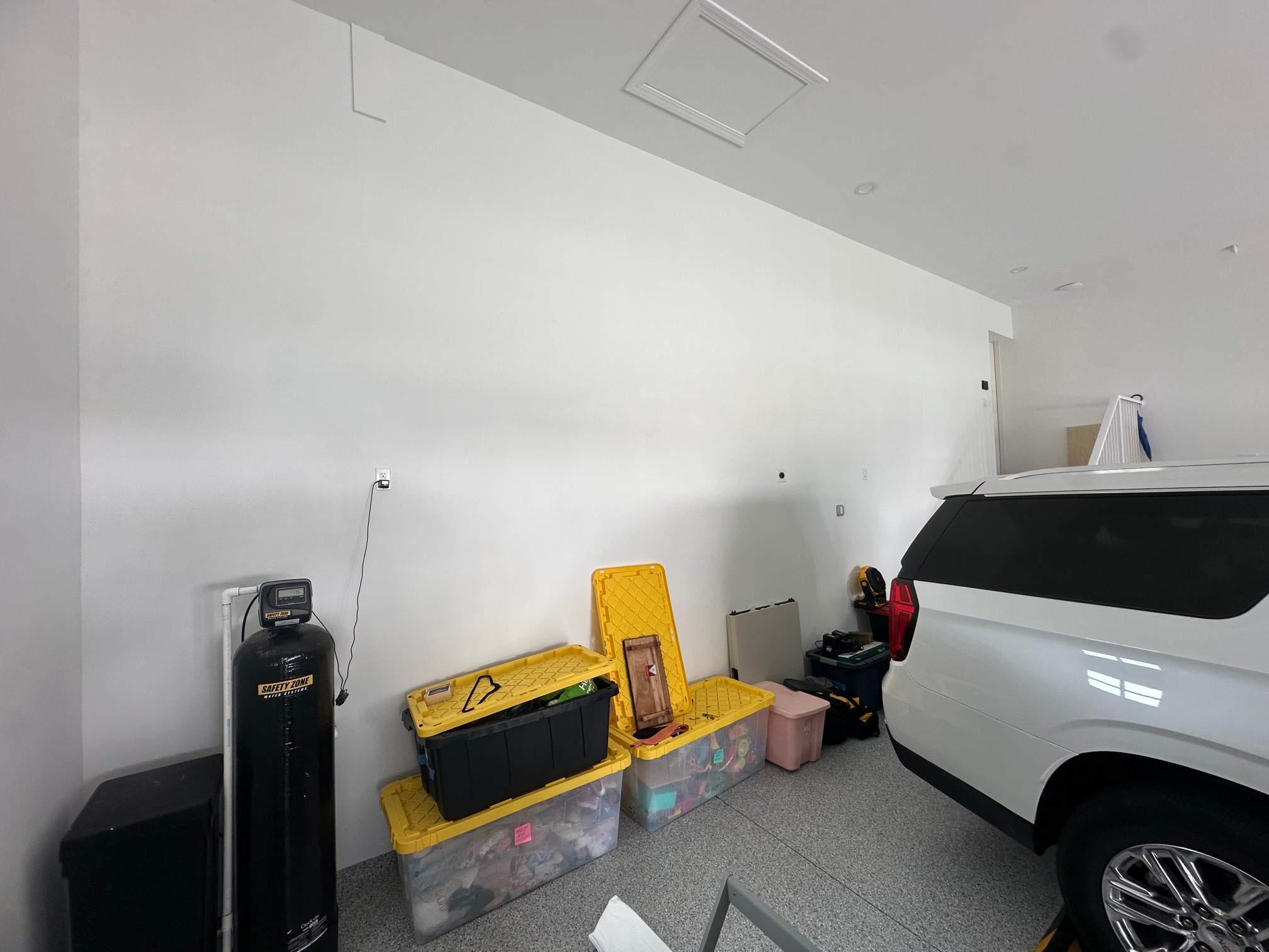 Custom Garage Storage Cabinets and Epoxy Floor Coating in Tampa by Square 1 Garage and Closet Solutions