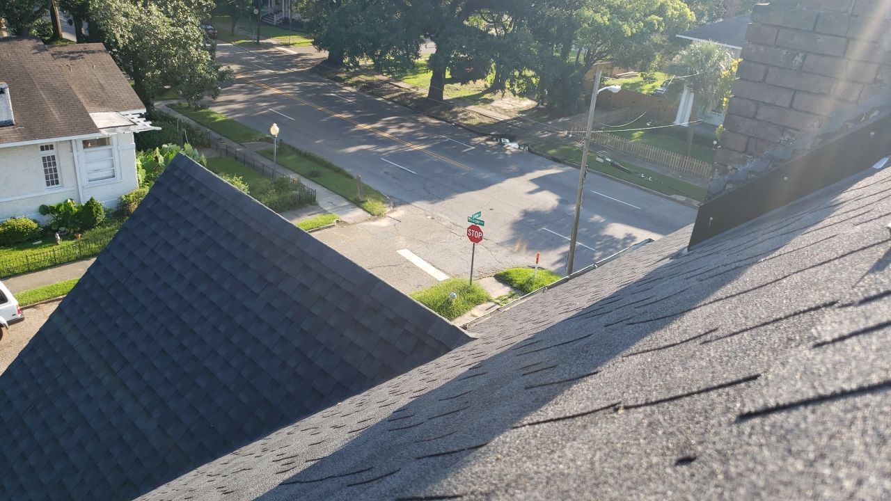 Residential Roofing Installation using Roof Replacement by American Roofing & Construction LLC