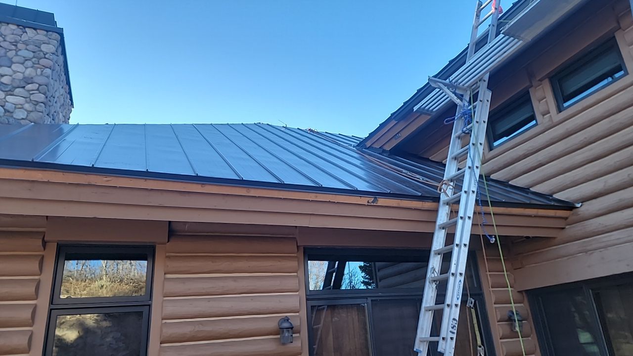 Standing Seam Metal Roof Replacement After Snow Damage by ASAP Roofing & Restoration