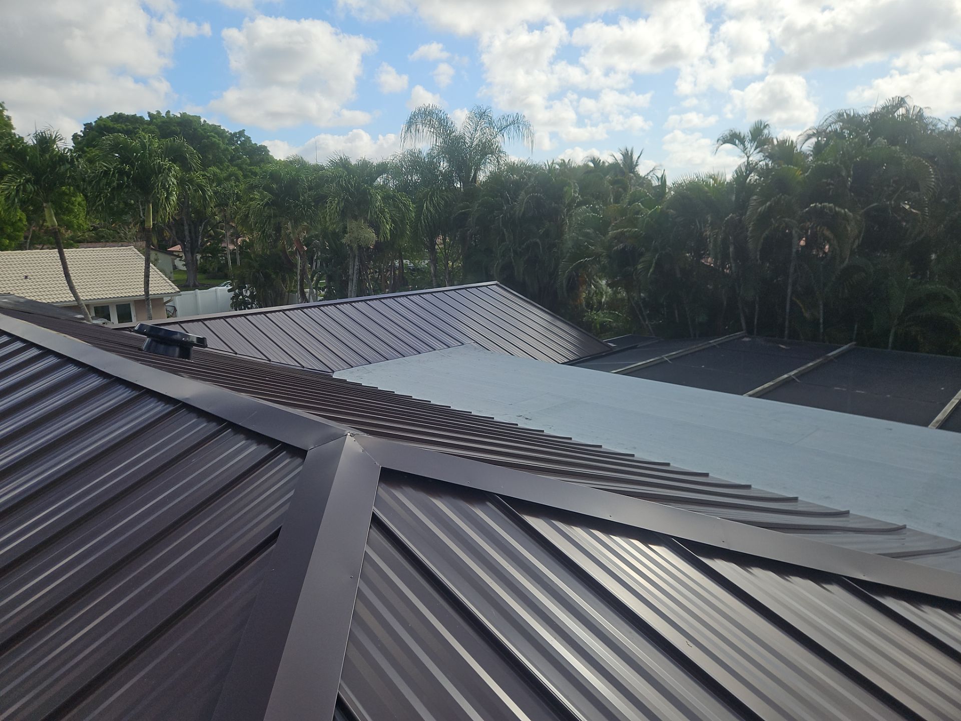 Residential Roofing Installation using 1" Nail strip metal roof by BLUES BROTHERS ROOFING
