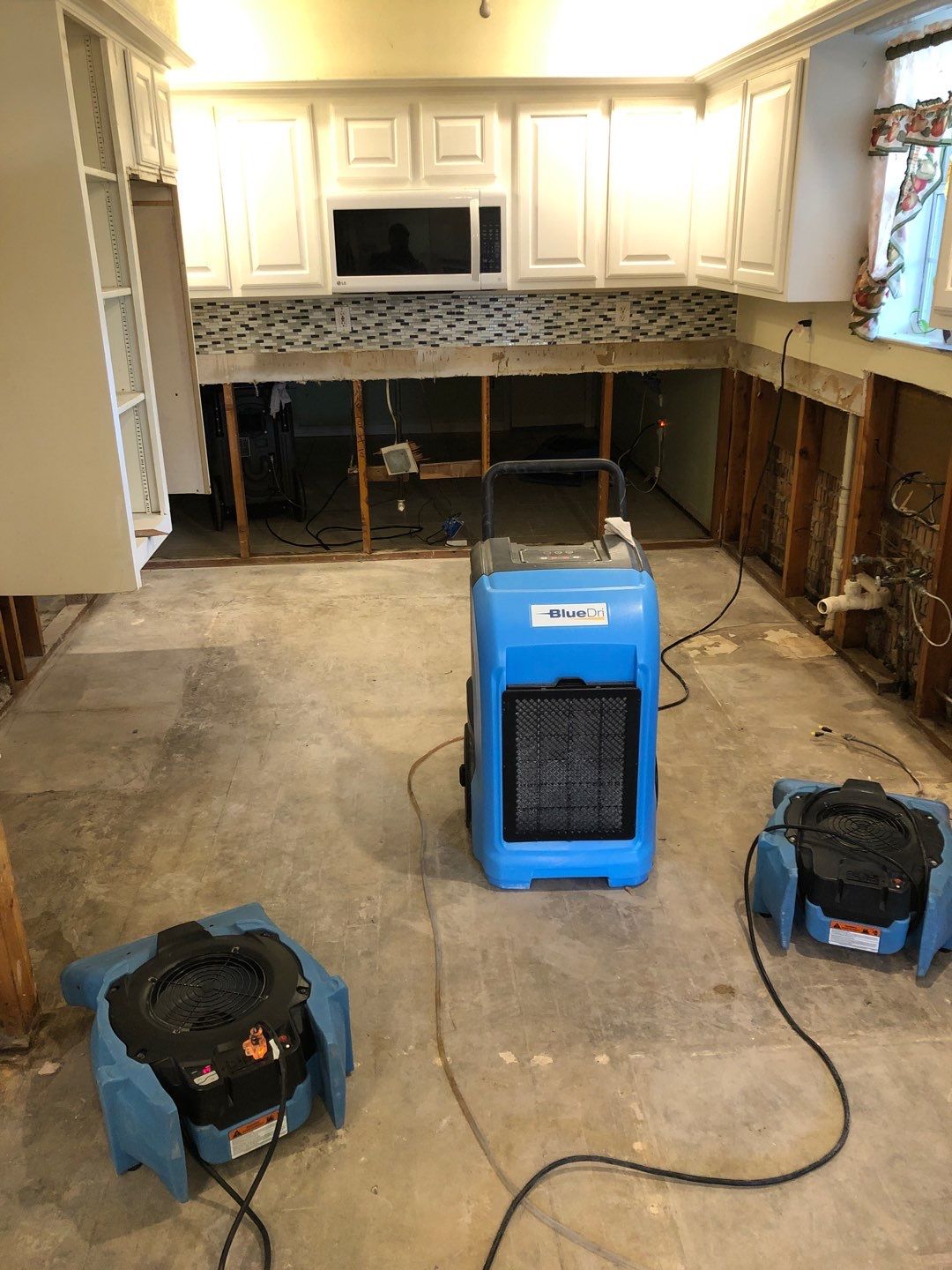 Home Remodel after Huge Water Damage by L&T General Contractors and Restoration INC