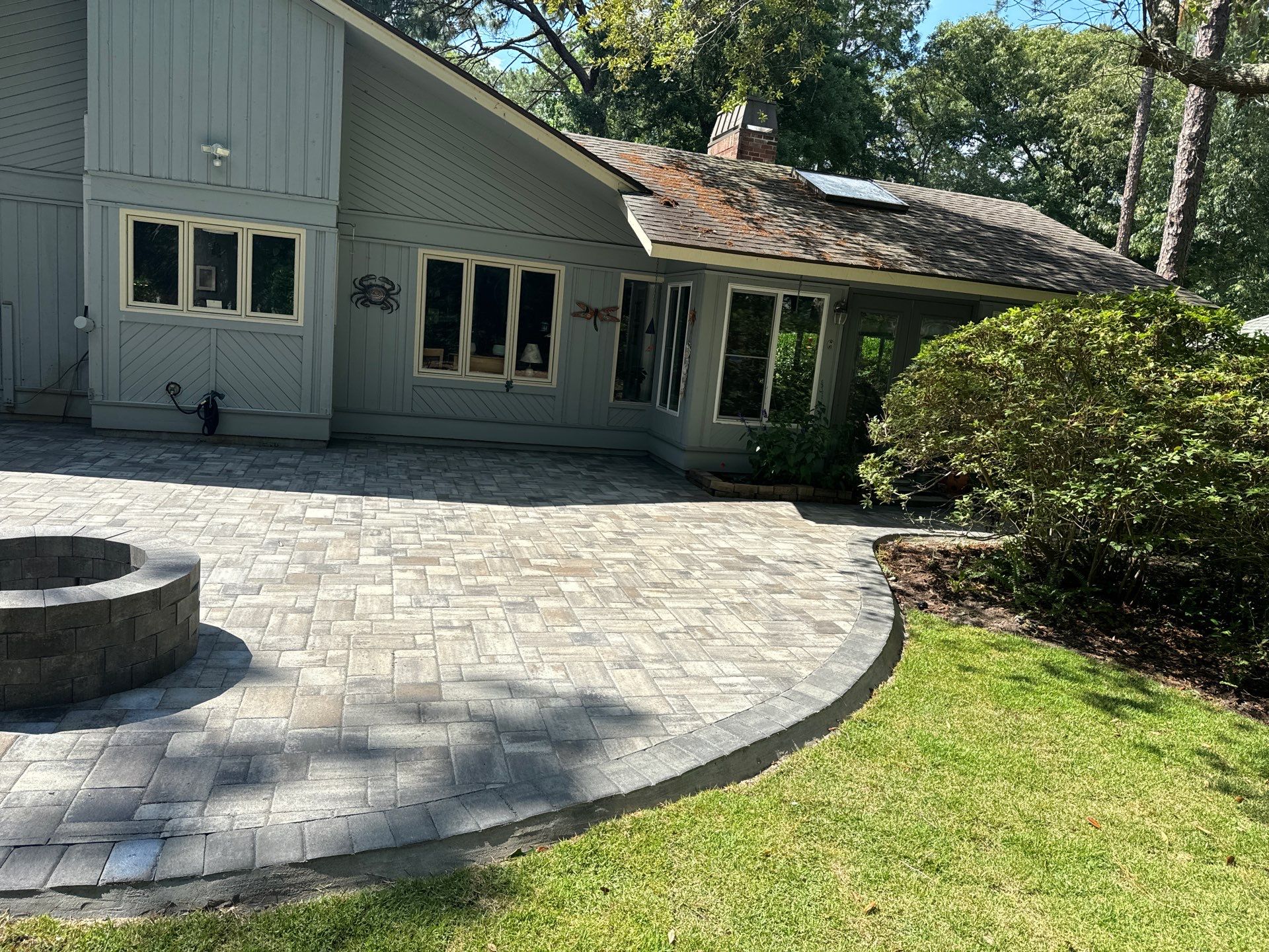Custom Gray Paver Patio and Fire Pit Installation in Hilton Head Island by Lowcountry Scapes, LLC