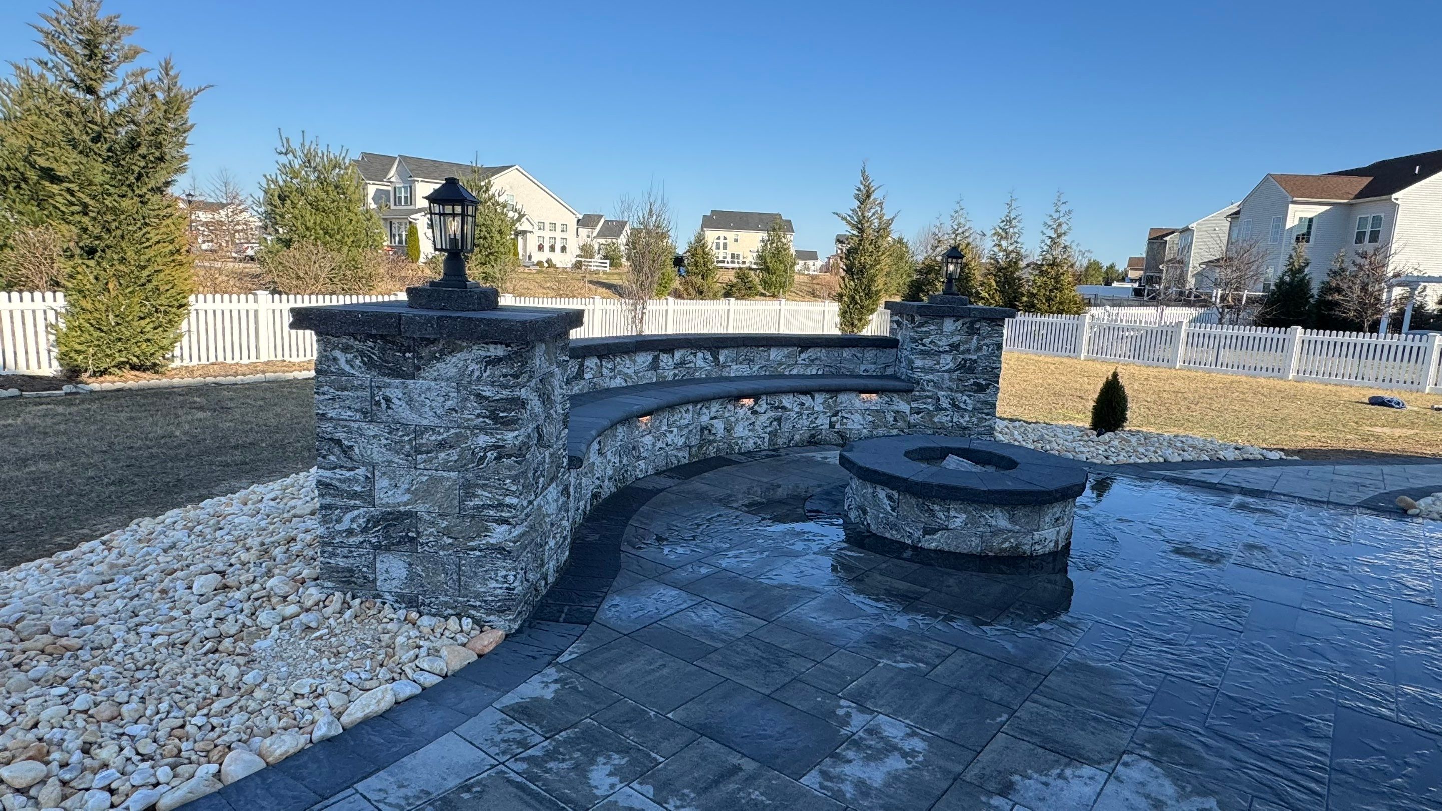 Custom Belgard patio by Studio G Indoor Spaces & Outdoor Living