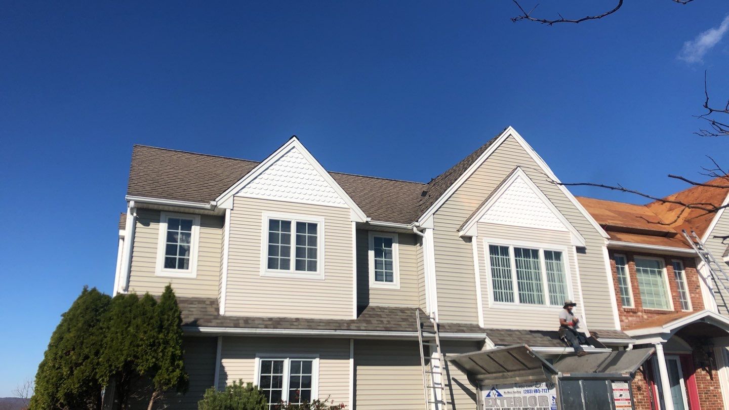 Commercial Roofing Installation using Owens Corning TruDefinition driftwood by A Plus Exterior