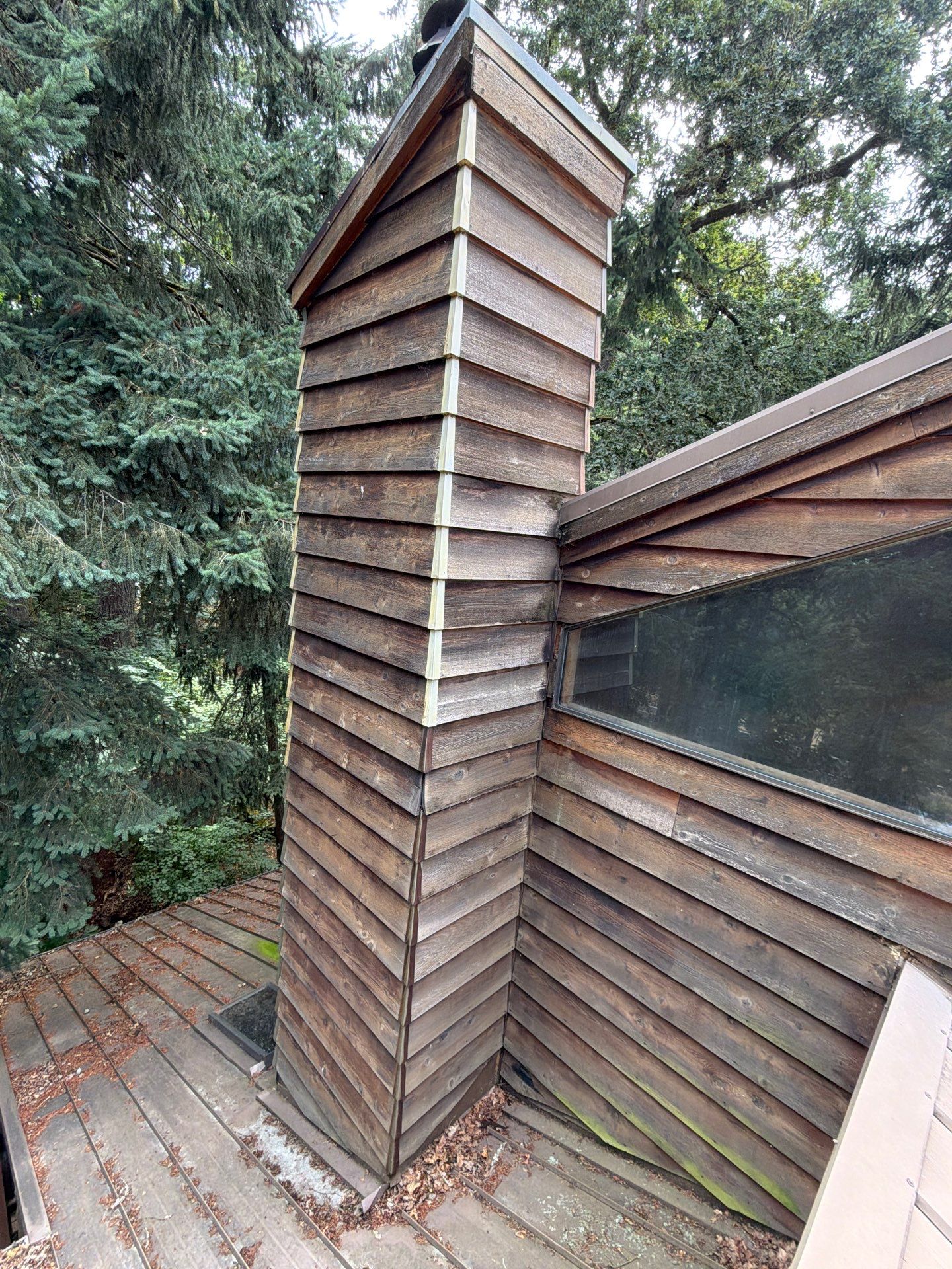 Cedar Siding Replacement on the Chimney by Handyman State LLC