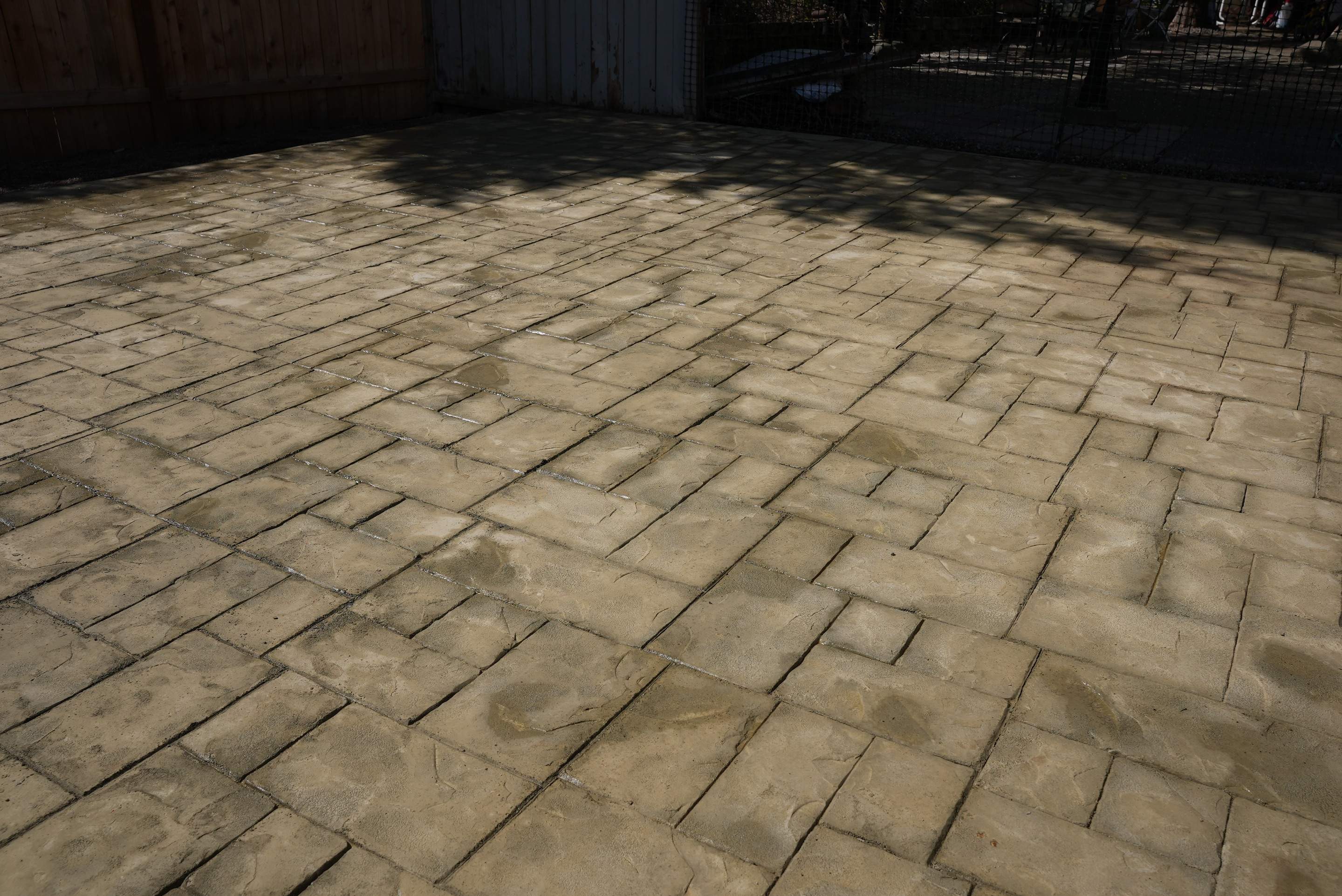 Benedict | Stamped Concrete Back Patio by Jireh Asphalt & Concrete Inc 