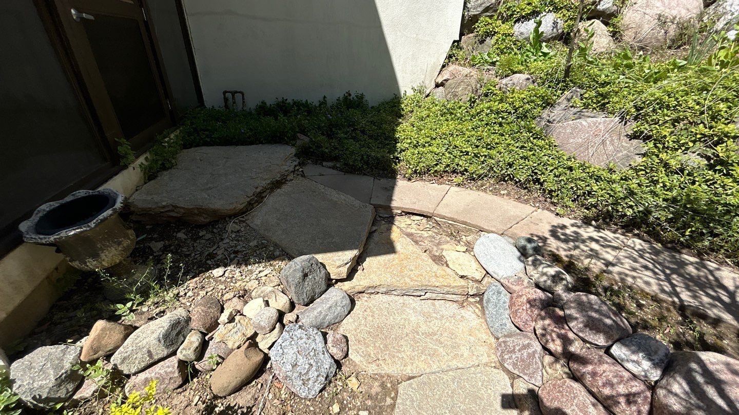 natural stone using Algaecide, soft wash soap by Northern Power Washing LLC.
