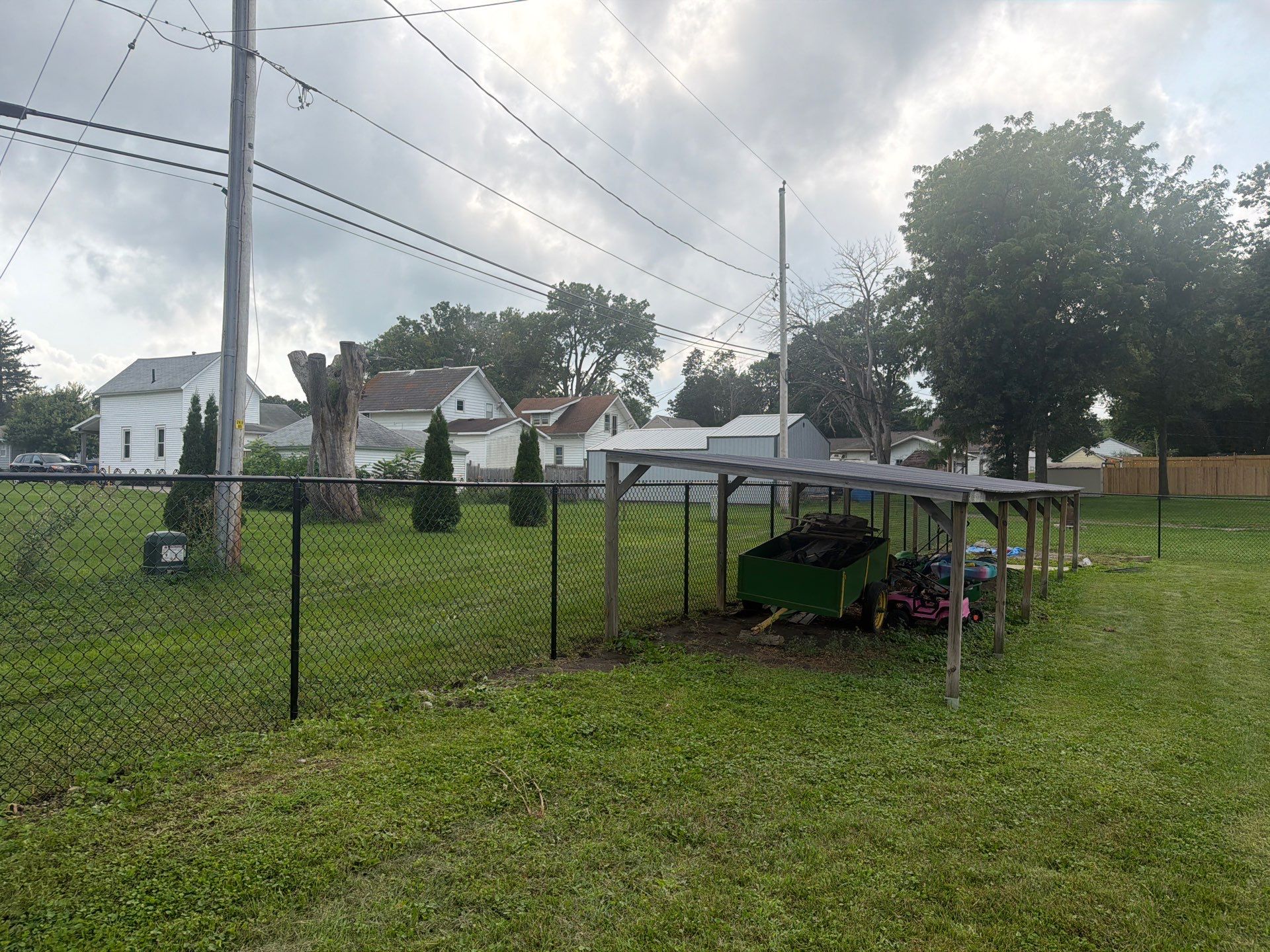 Residential Black Chain Link Fence Installation in Reinbeck by Perfect Picket Fence and Stain