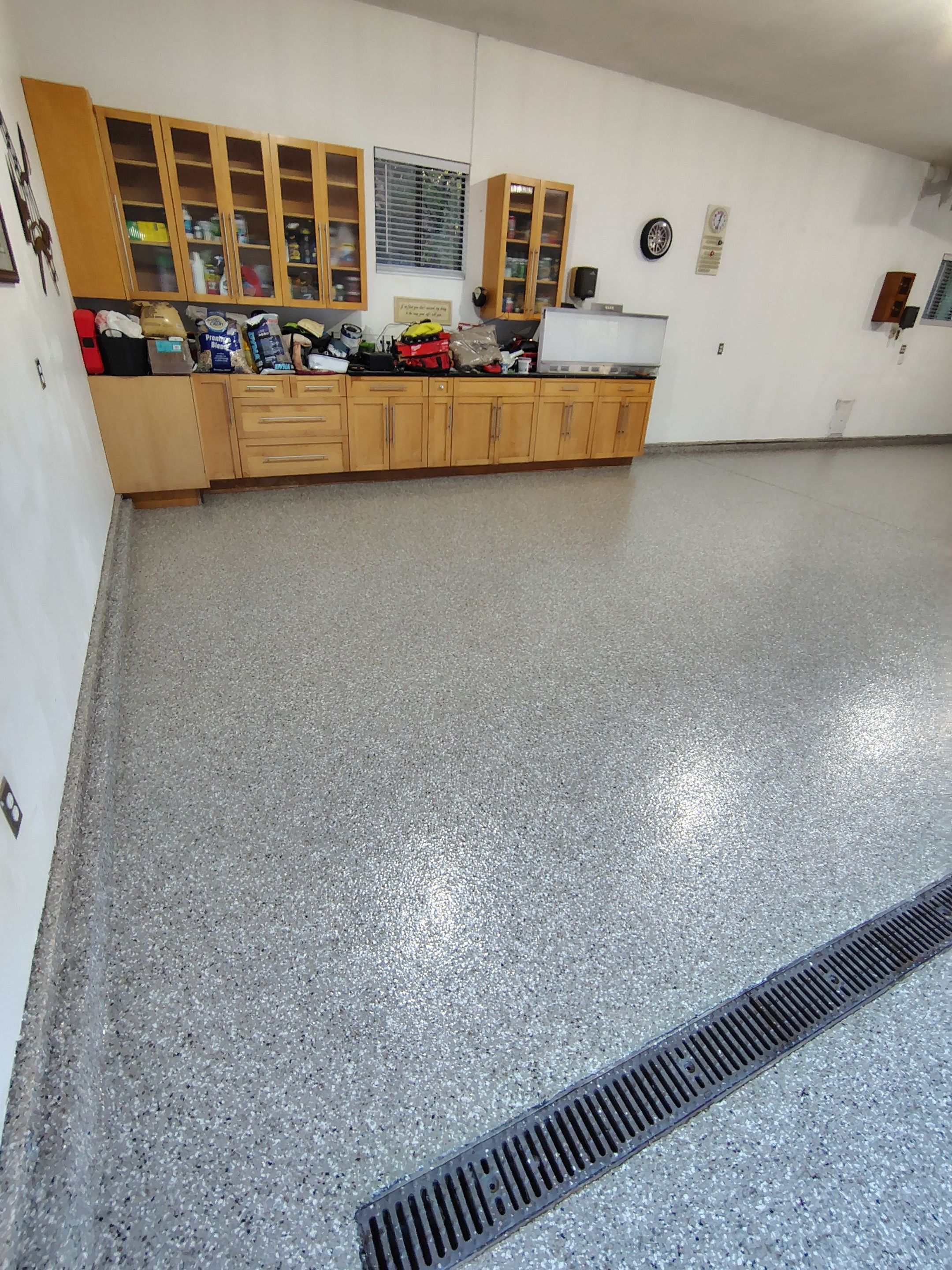Garage Floor and Entry Step Concrete Coating in Sioux Falls by Select Painting, Coatings & Garage Cabinets