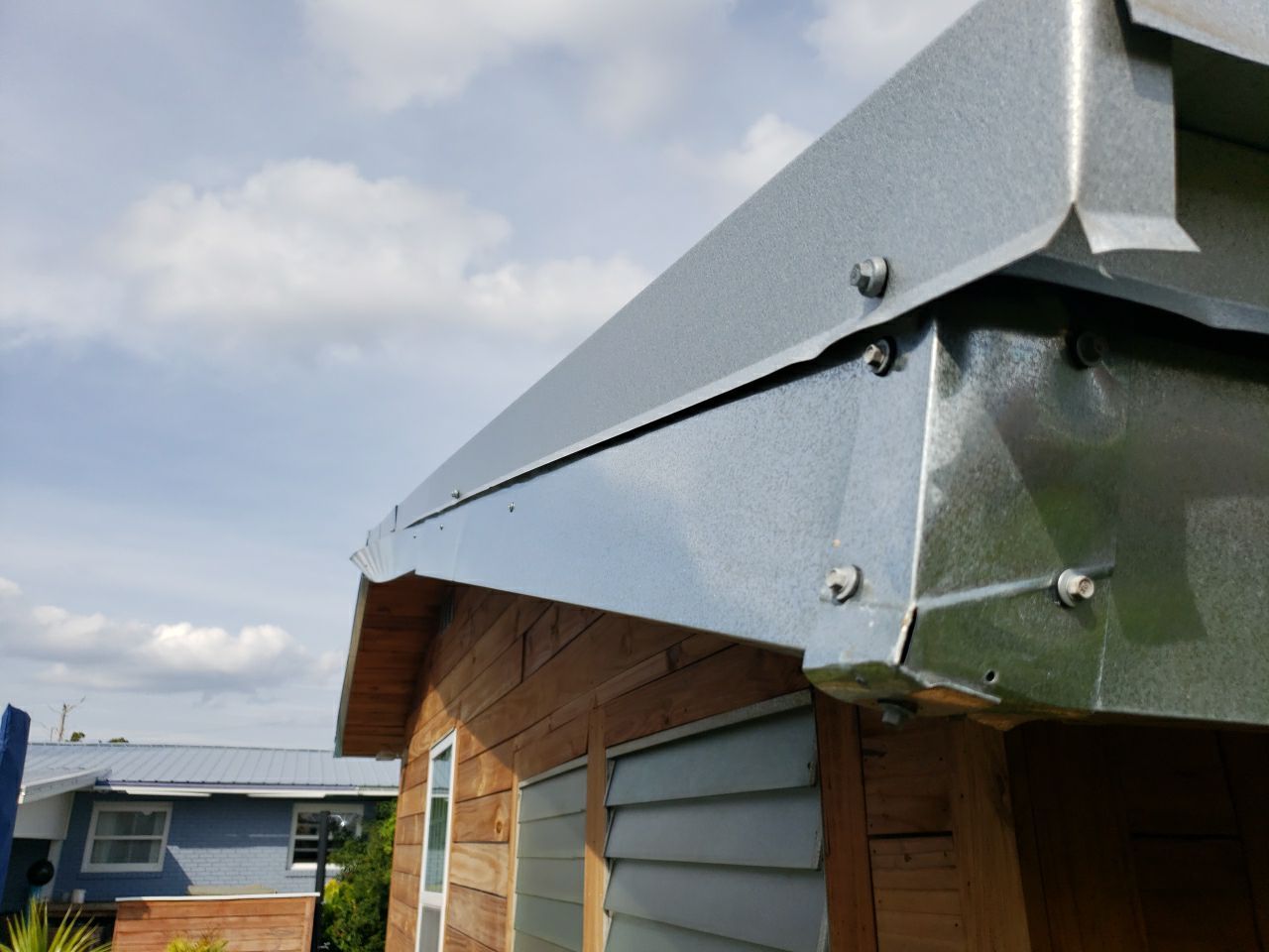 Gutter Installation using K-Style Seamless Gutters and Soffit and Fascia Replacement by Gutter Professors