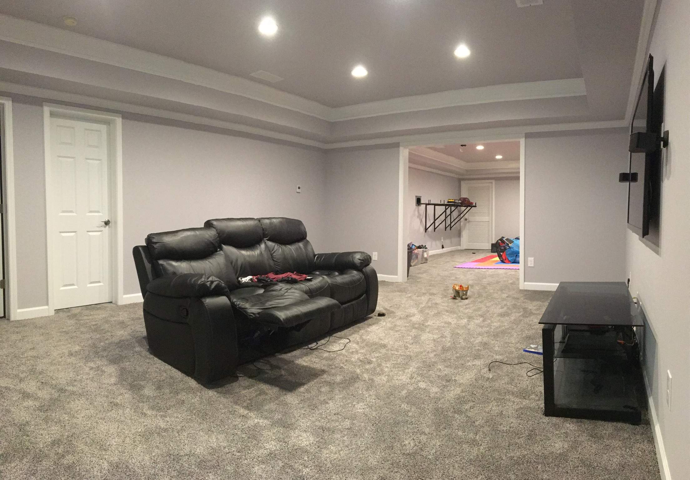 Finished Basement with Custom Media Room and Bathroom in Duluth by Swift Home Renovations