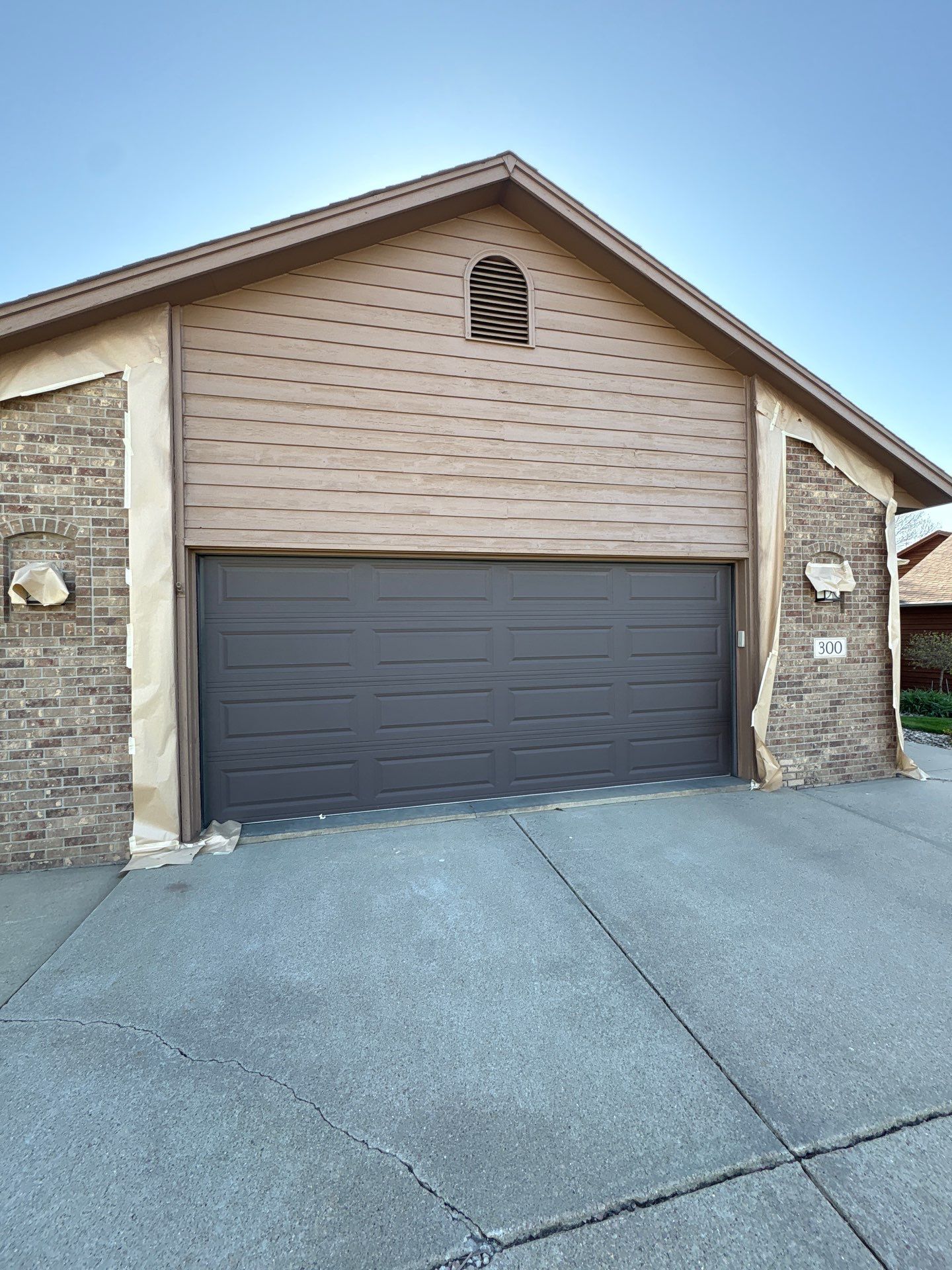Wood Siding Restoration and Exterior Painting in Sioux Falls by Select Painting, Coatings & Garage Cabinets