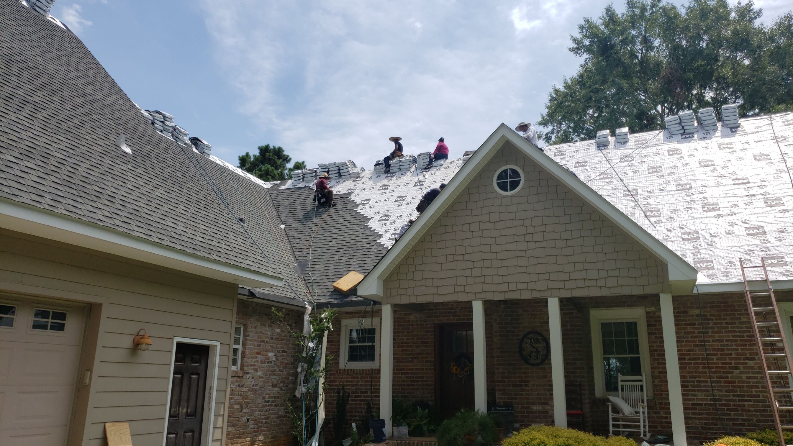 Residential Roofing Installation using Roof Replacement by American Roofing & Construction LLC