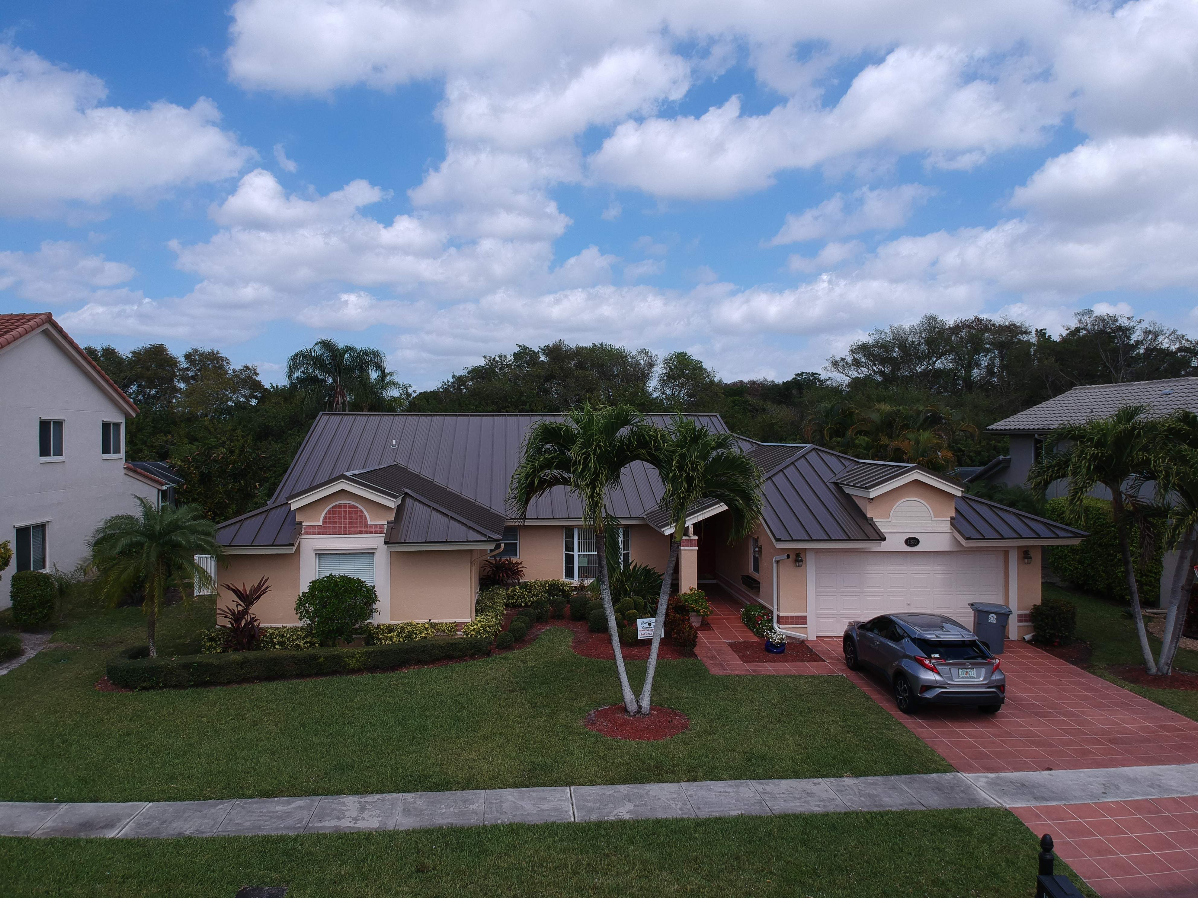 Residential Roofing Installation using 1" Nail strip metal roof by BLUES BROTHERS CONSTRUCTION CORP