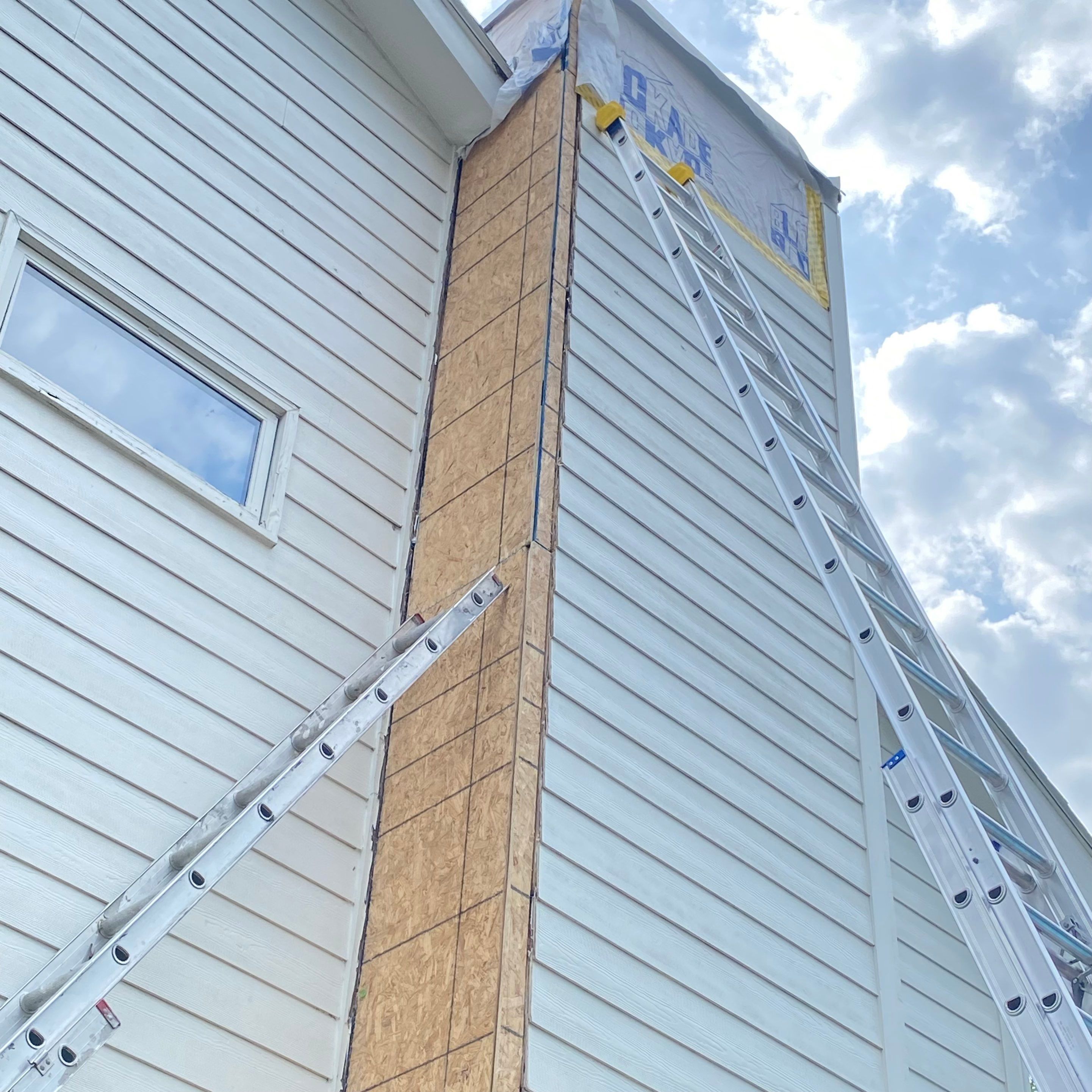 Siding Repair by Crows Roofing