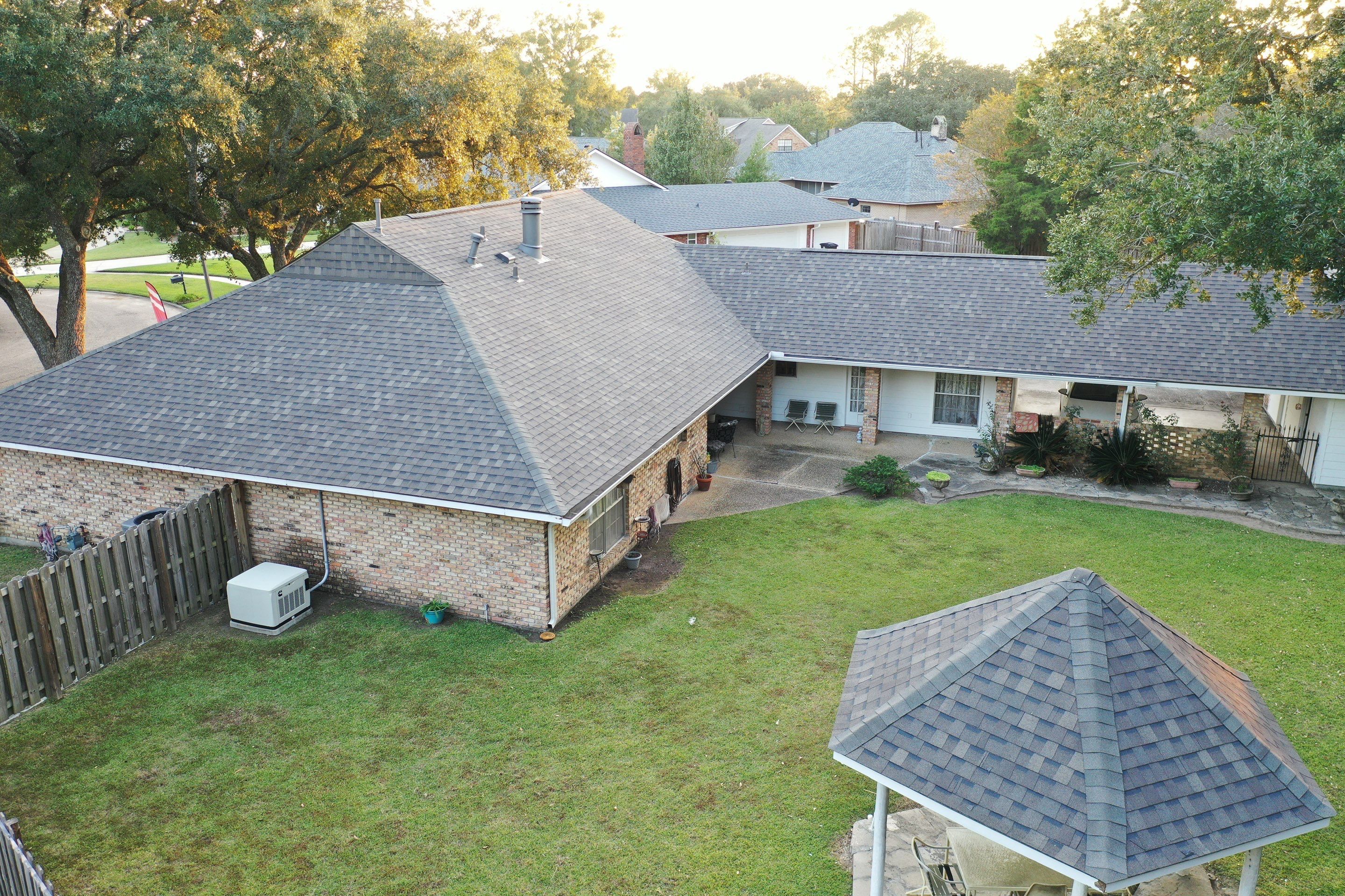Atlas Pinnacle Pristine Weathered Wood by Top Team Roofing & Construction
