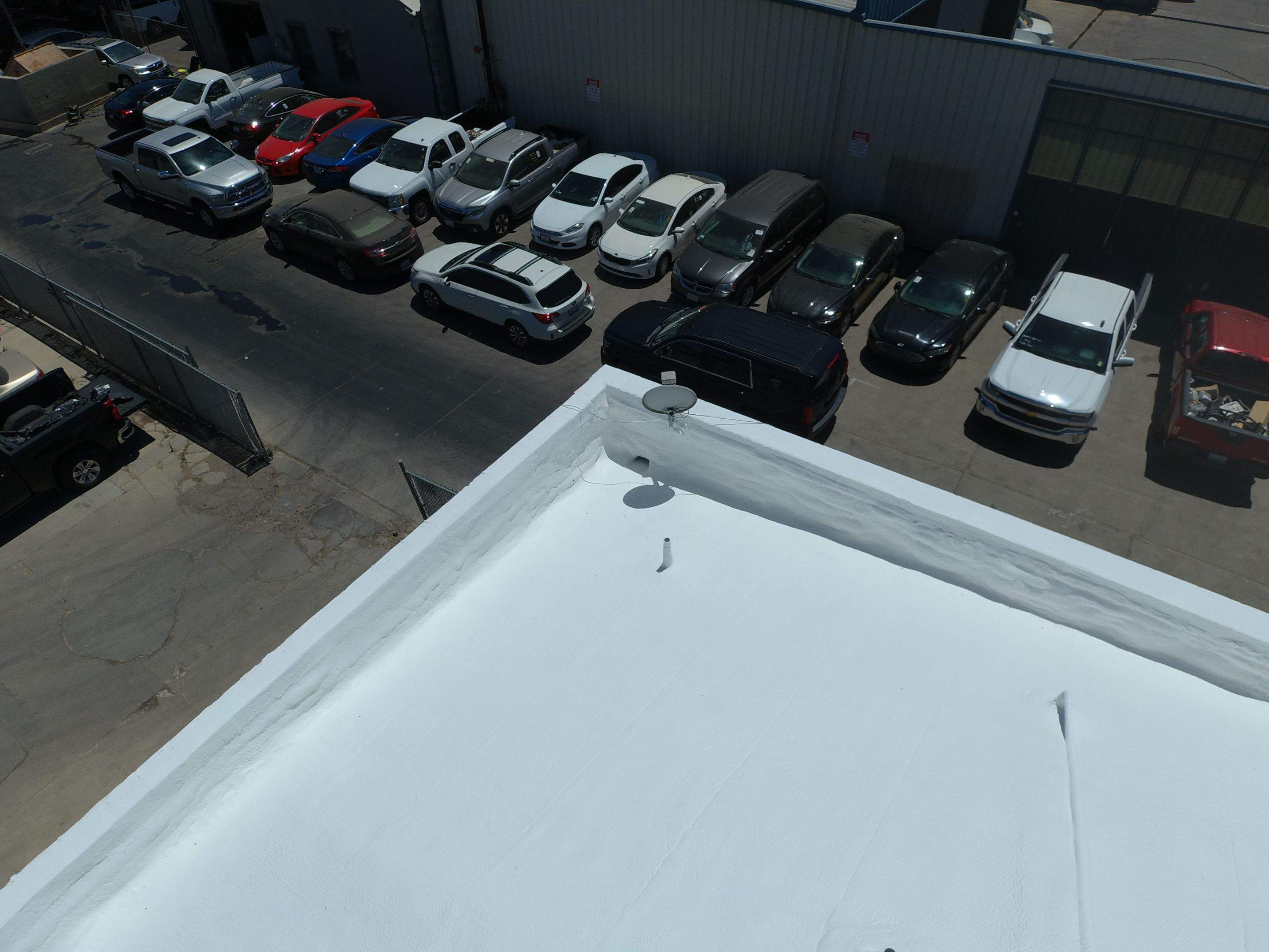 Spray foam and coatings using Conklin Benchmark/PUMA XL coatings and spray foam by Straight Edge Roofing Inc