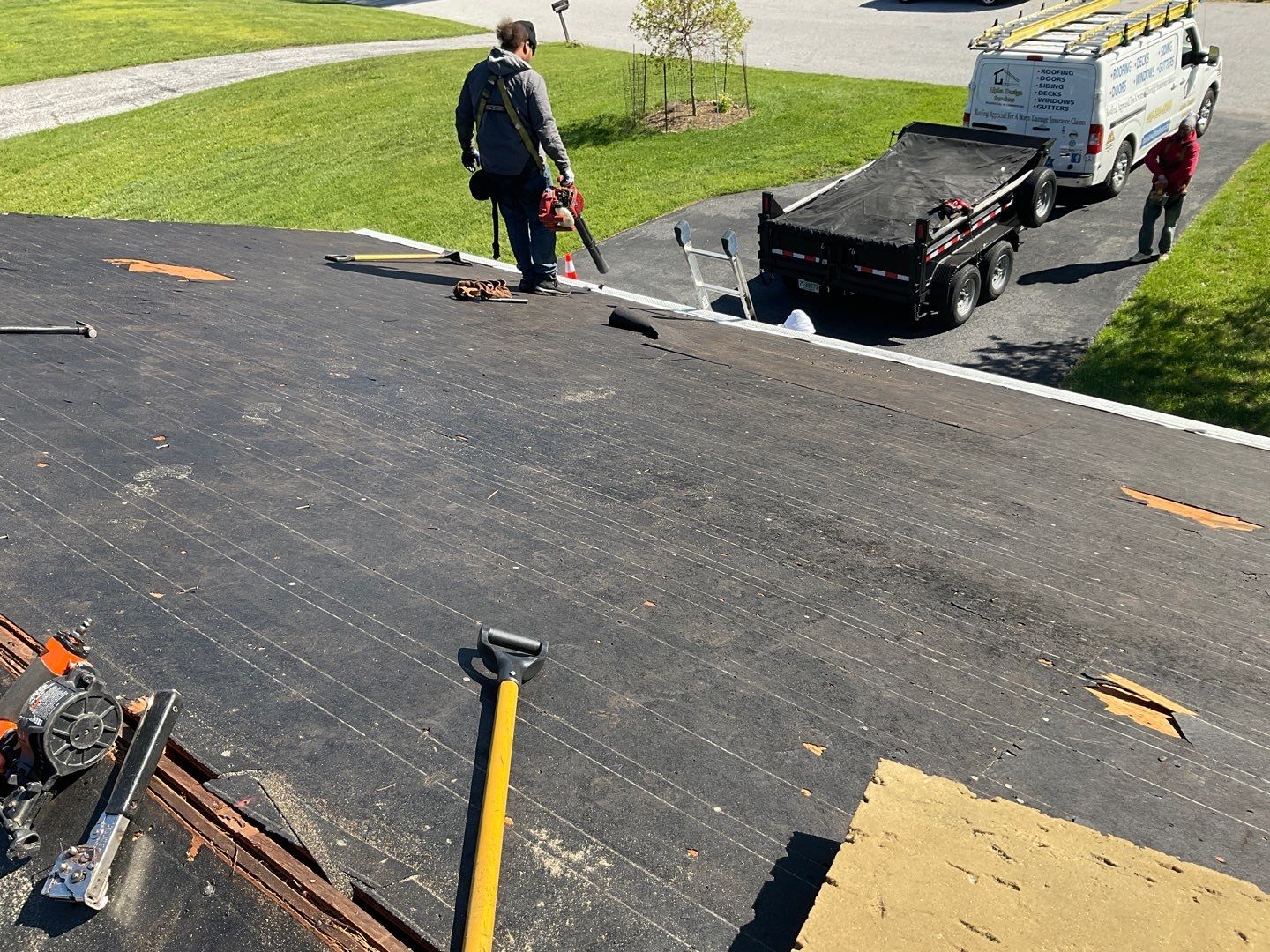 Residential Roofing Installation using Landmark Shingles Color Weatherwood by Alpha Design Services