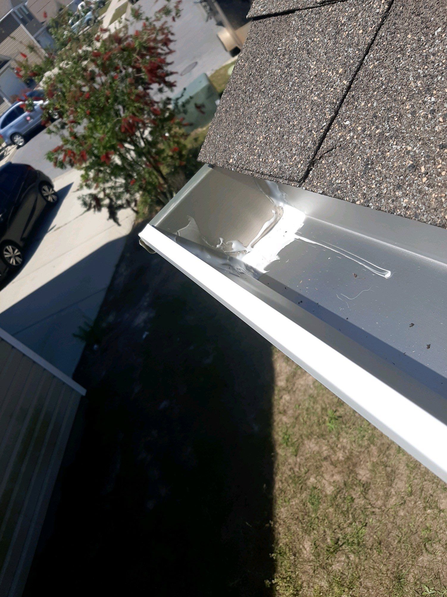 Gutter Installation Using White K-Style Seamless Gutters by Gutter Professors