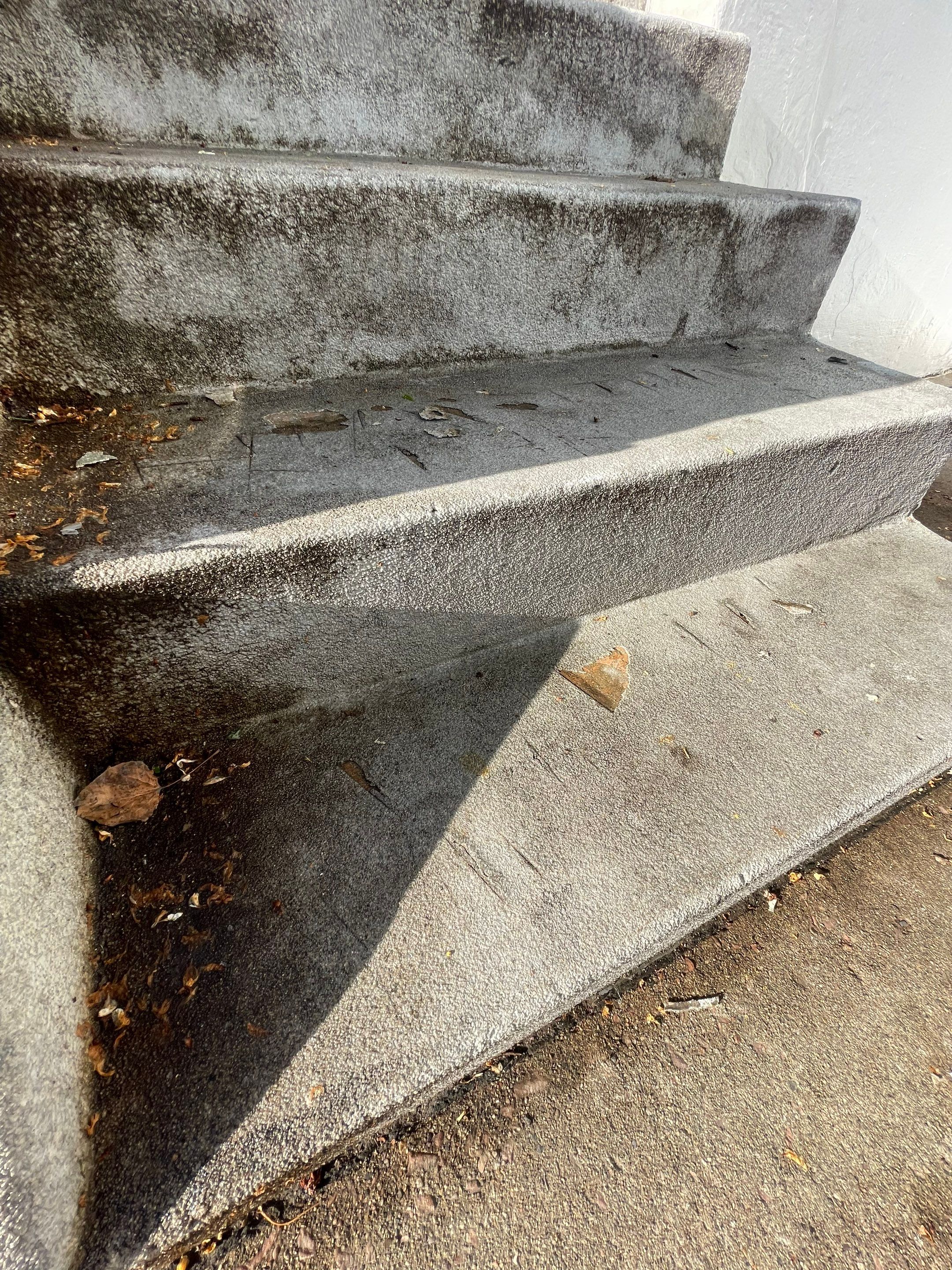 Grey Polyaspartic Porch and Stair Resurfacing in Sioux Falls by Select Painting, Coatings & Garage Cabinets