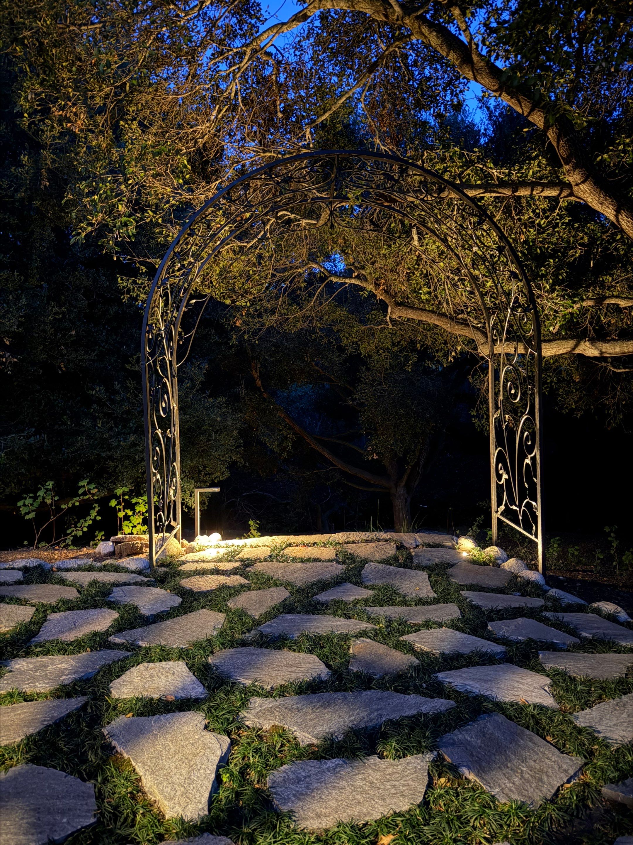 Tudor Estate Landscape Lighting with Integrated Stone Step Illumination by Outdoor Lights + Shades