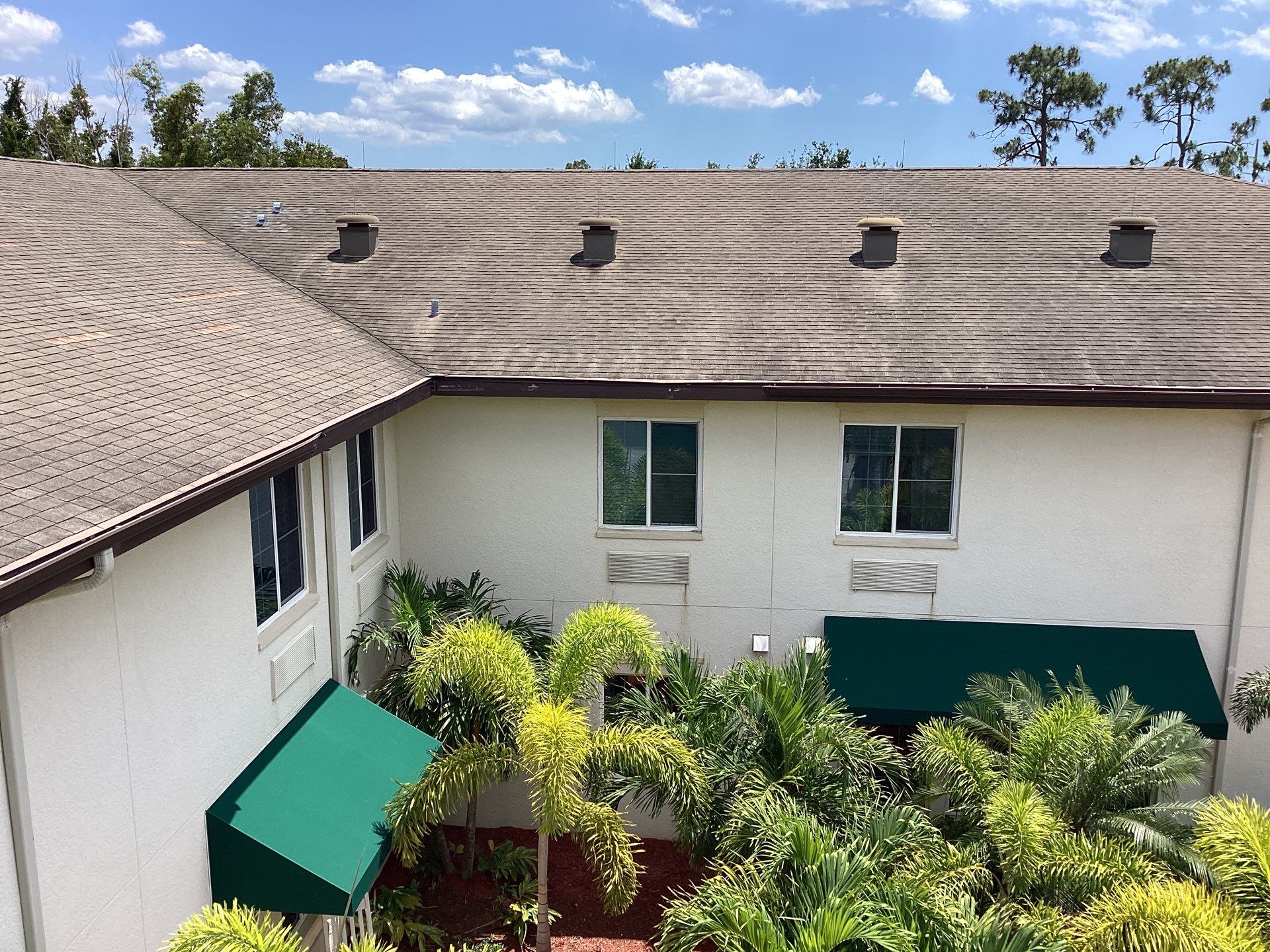 Musket Brown Seamless Gutters using Musket Brown Seamless Gutters in Capen Coral FL by Gutter Professors