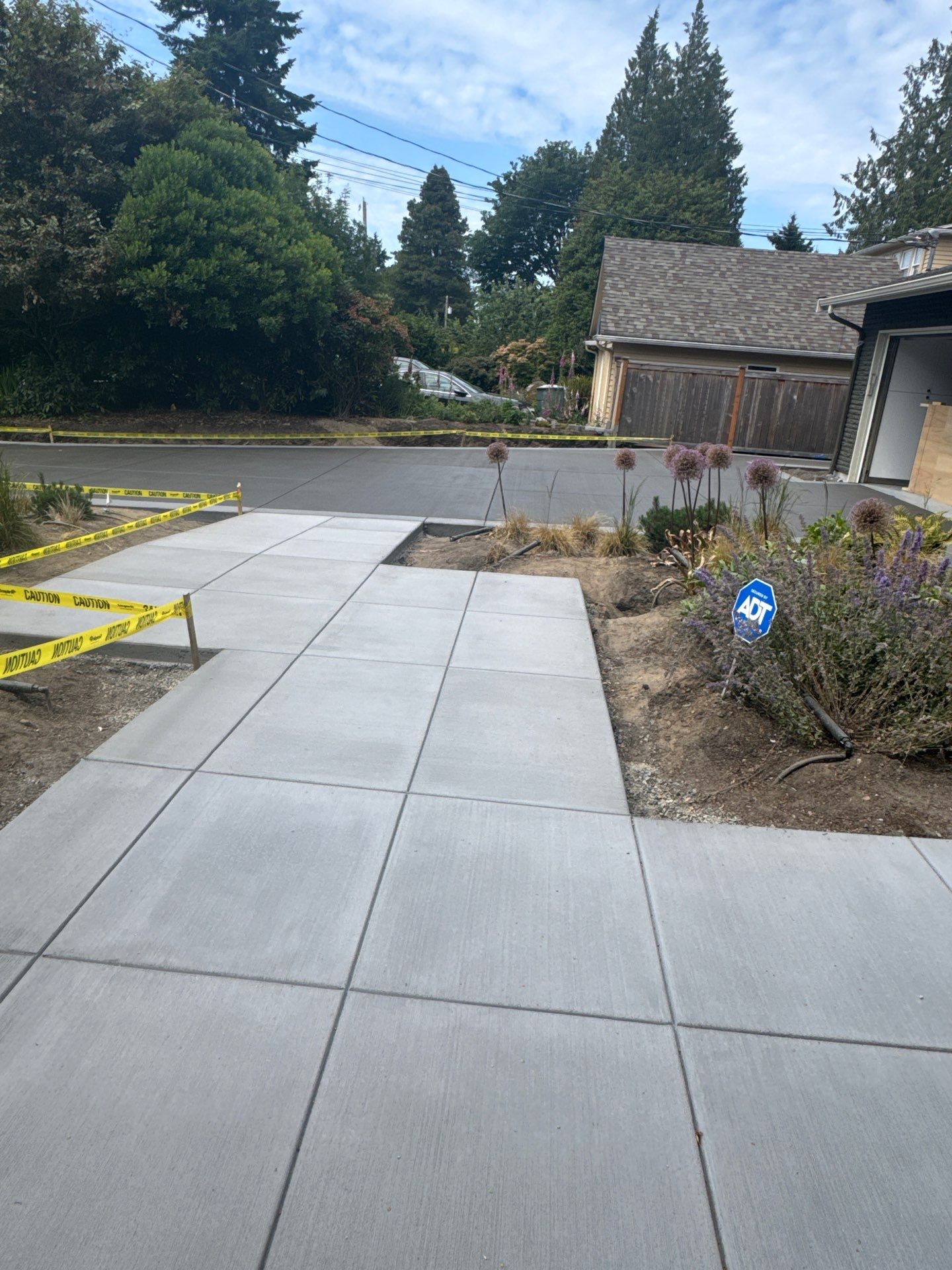 Concrete Driveway Makeover | Edmonds  by Jireh Asphalt & Concrete Inc 